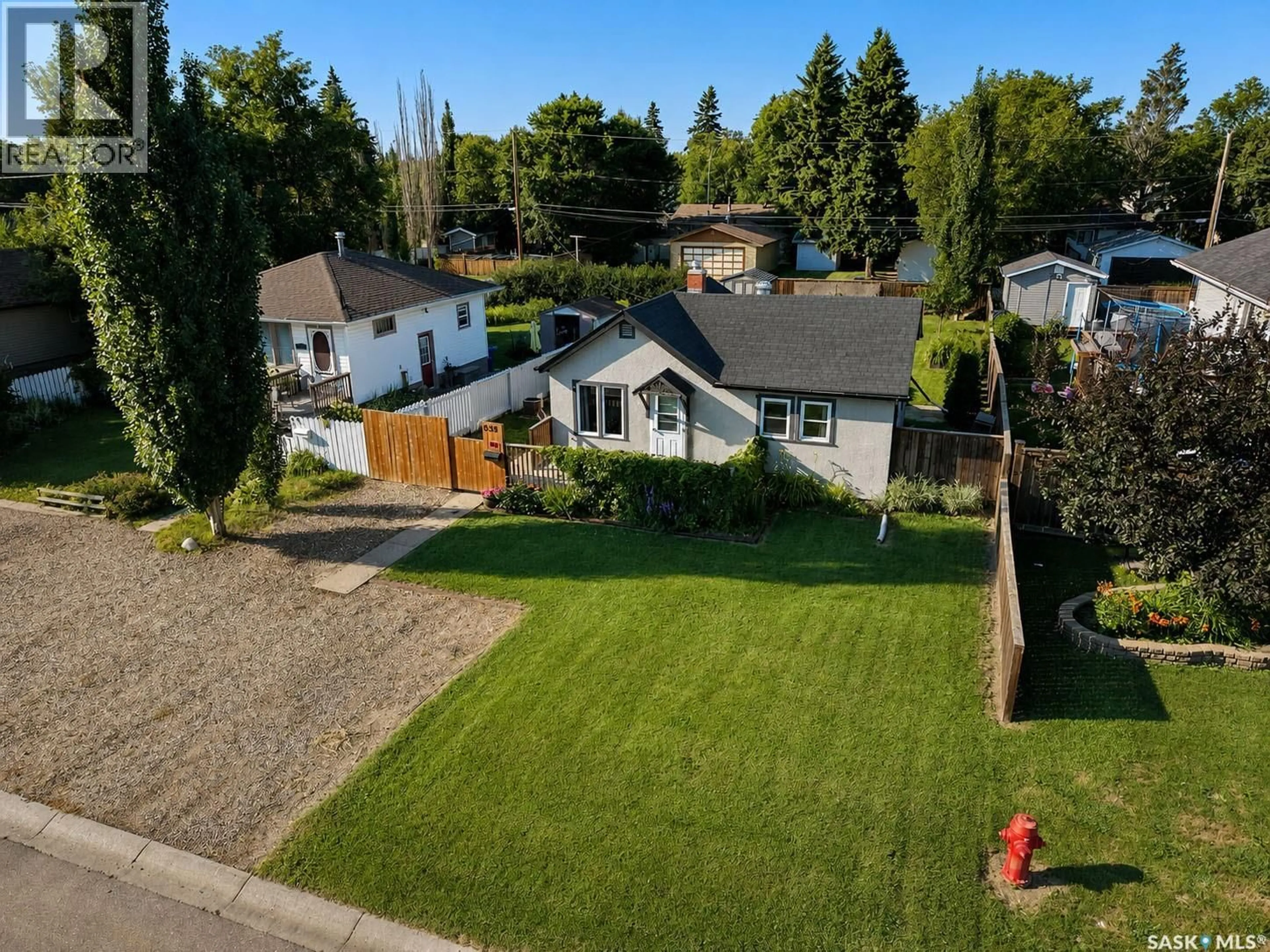 A pic from outside/outdoor area/front of a property/back of a property/a pic from drone, street for 838 3RD STREET, Prince Albert Saskatchewan S6V0H9