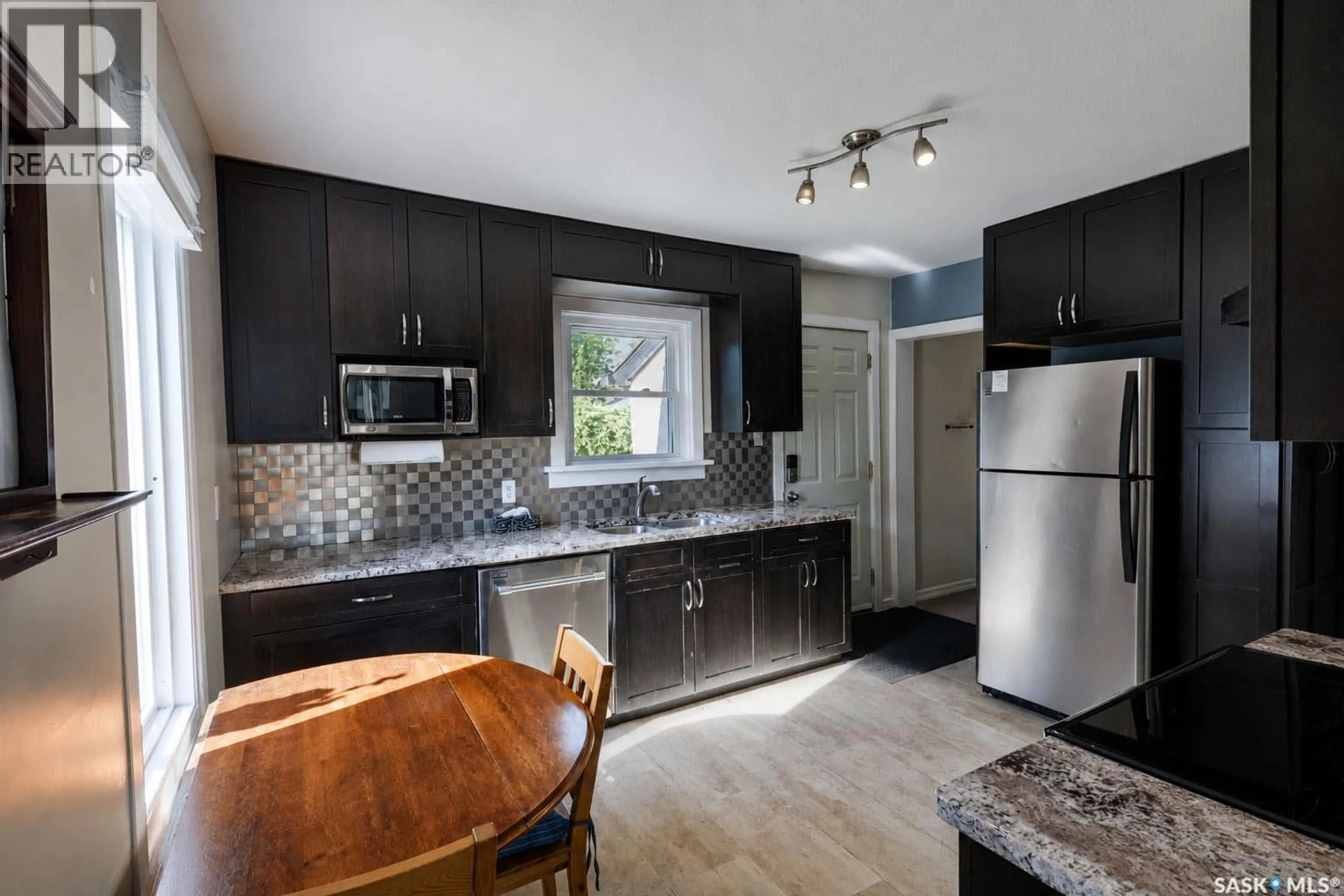 Open concept kitchen, unknown for 838 3RD STREET, Prince Albert Saskatchewan S6V0H9
