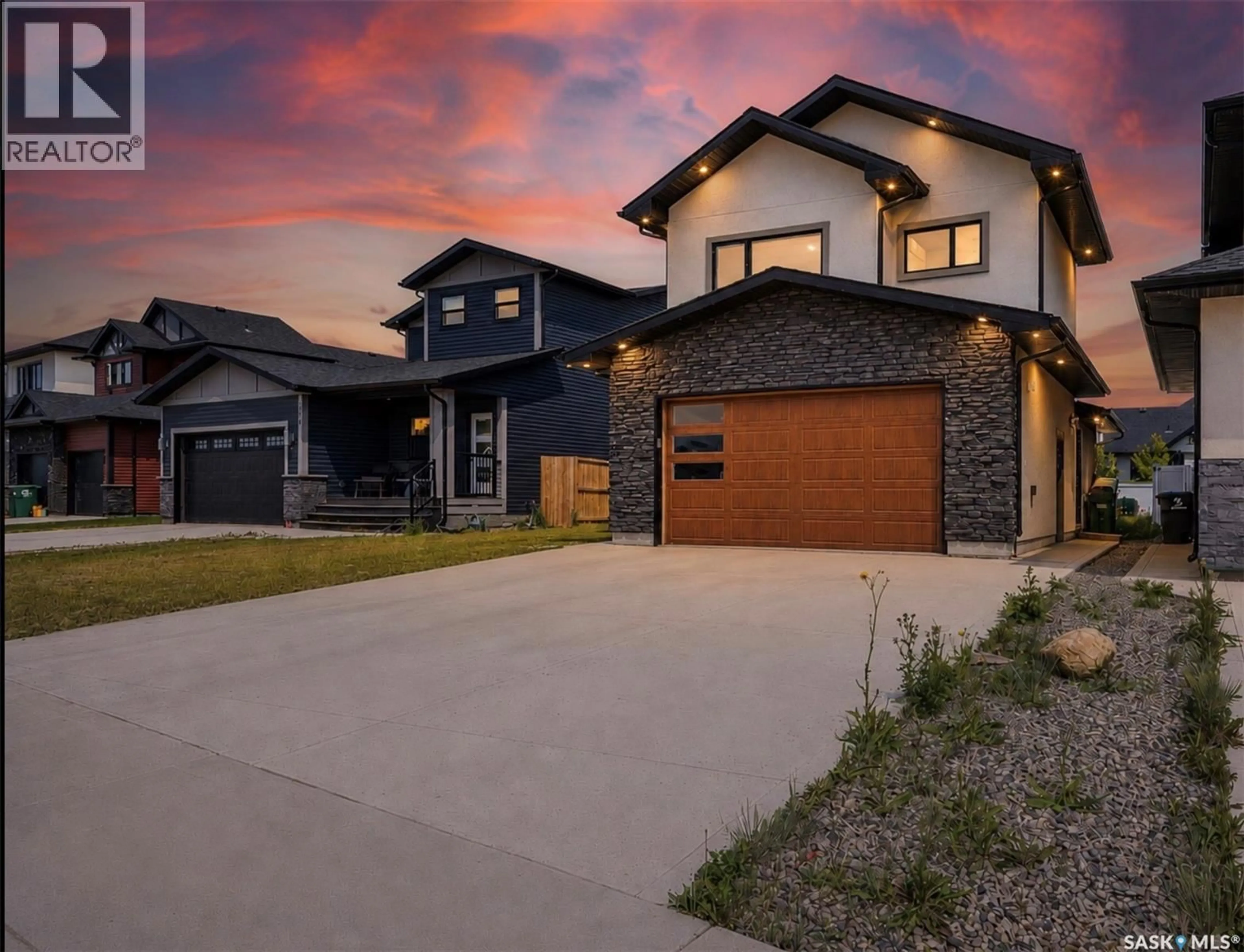 Home with brick exterior material, street for 106 KENASCHUK CRESCENT, Saskatoon Saskatchewan S7W0Y6