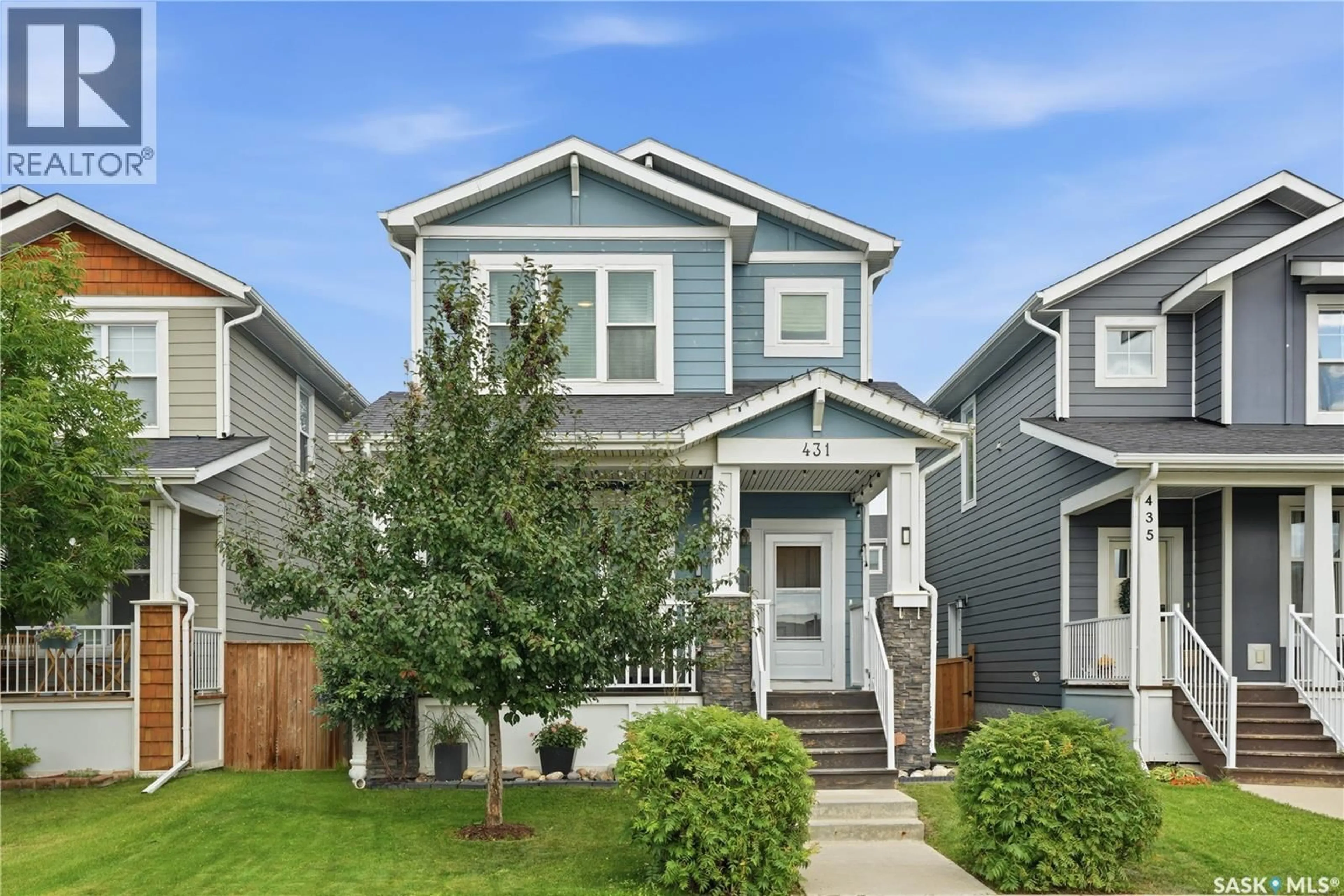 Home with vinyl exterior material, street for 431 EATON LANE, Saskatoon Saskatchewan S7V0H5