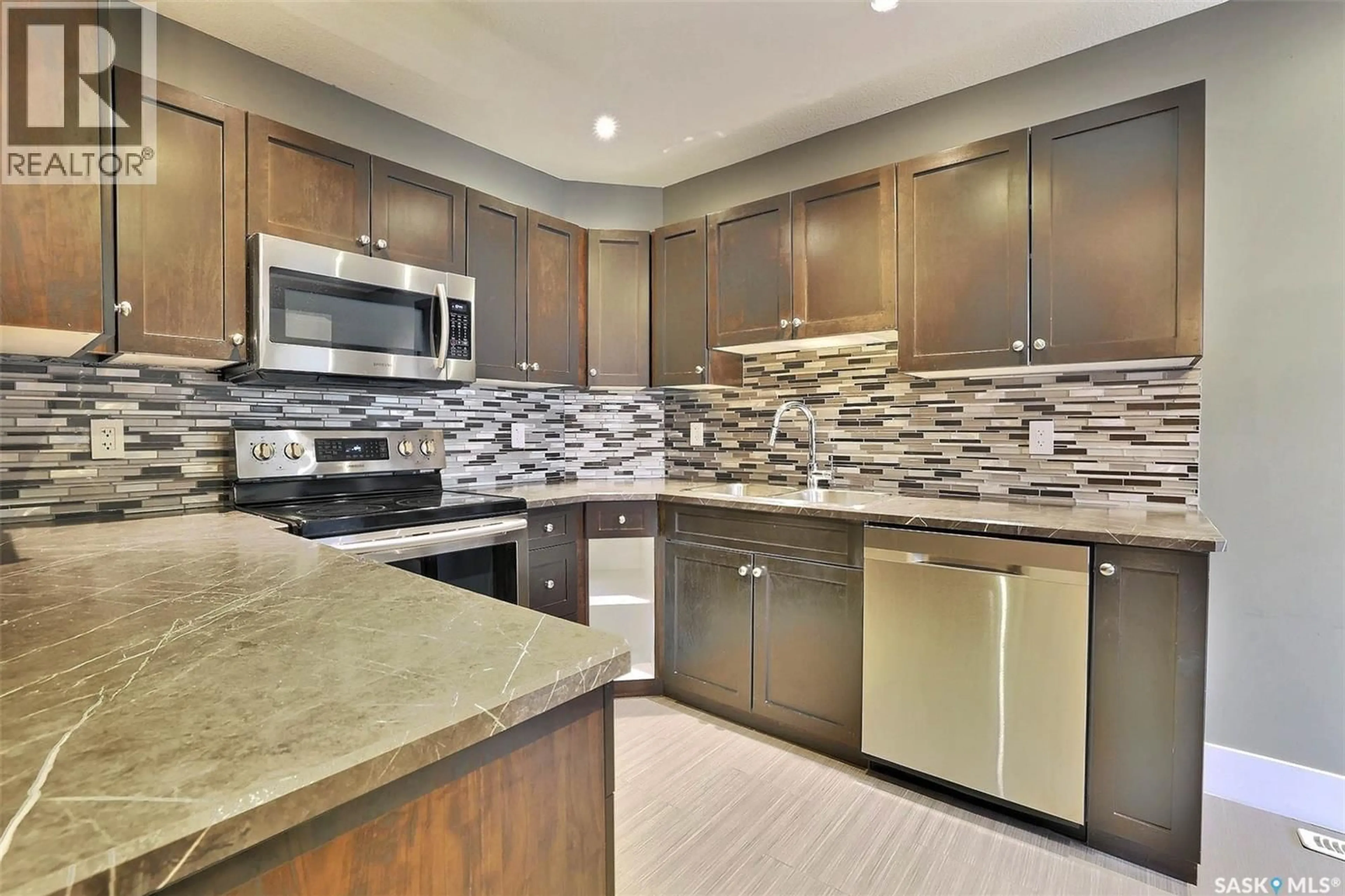 Open concept kitchen, ceramic/tile floor for 2248 HALIFAX STREET, Regina Saskatchewan S4P1V2