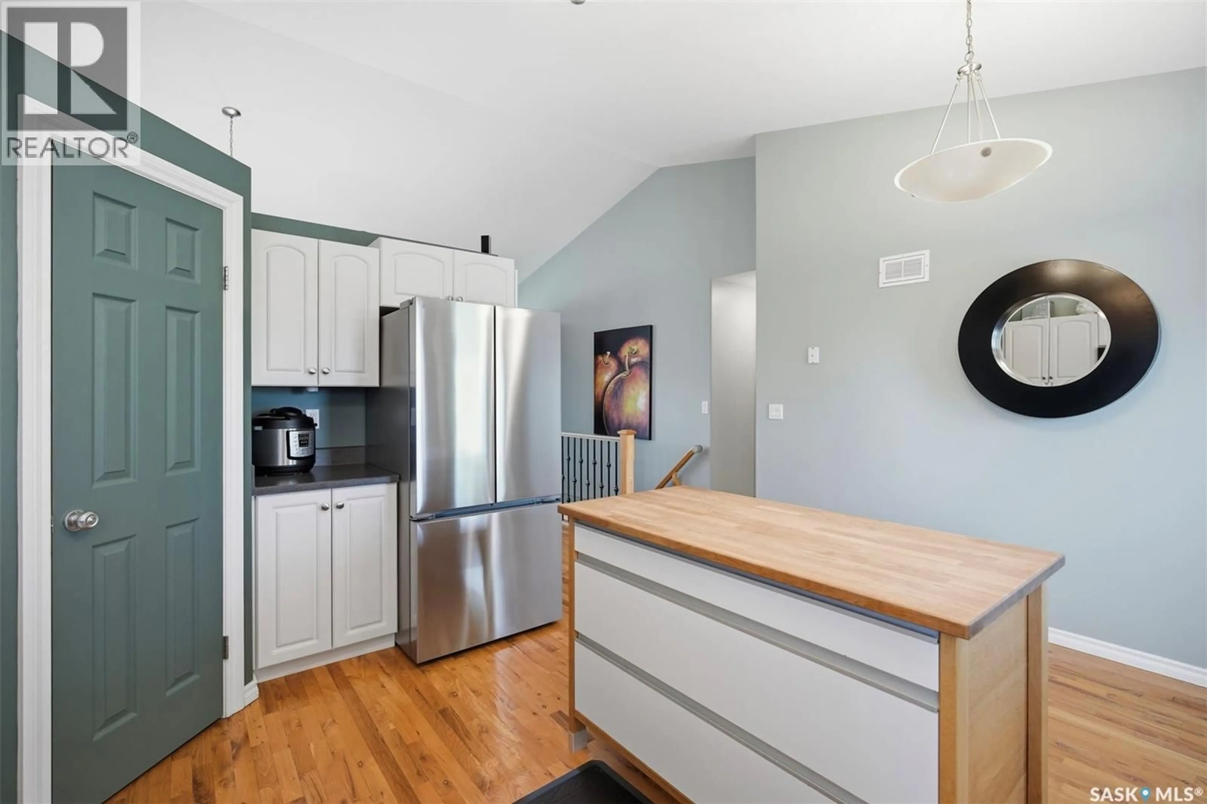 Open concept kitchen, wood/laminate floor for 238 BEECHMONT CRESCENT, Saskatoon Saskatchewan S7V1C8