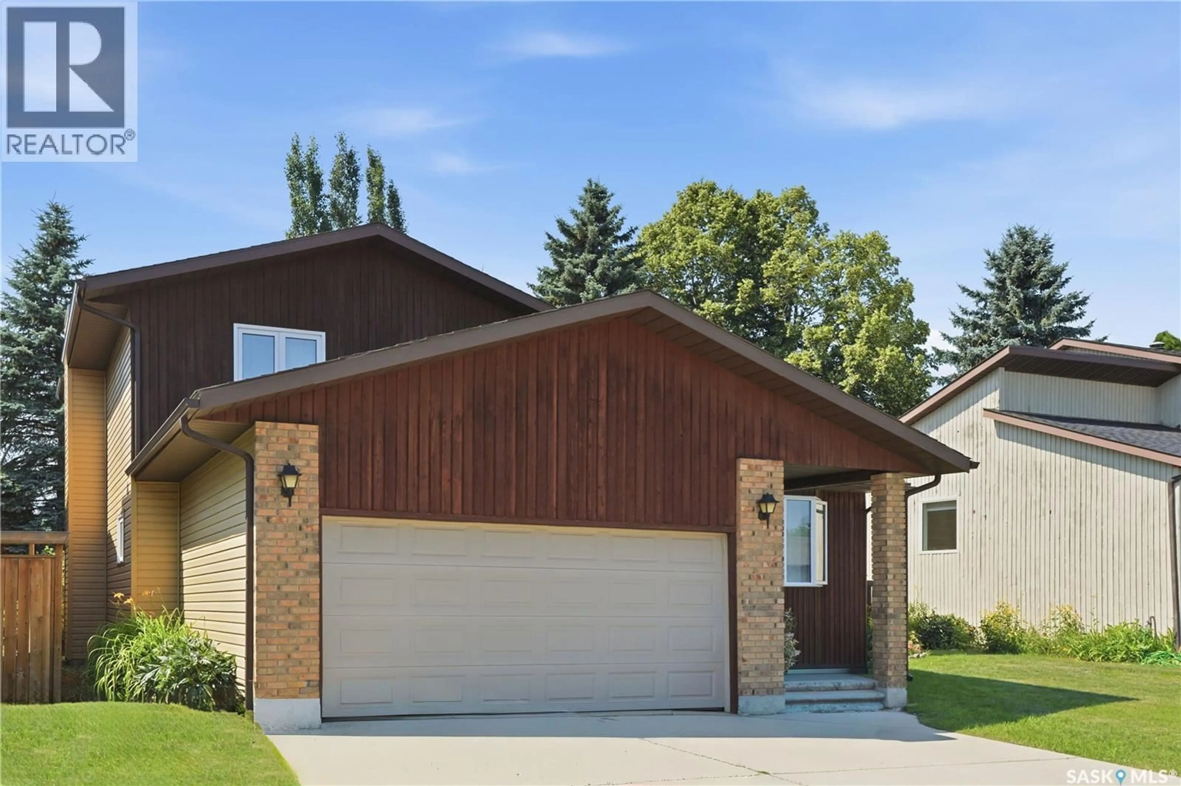 Home with brick exterior material, street for 522 DELARONDE ROAD, Saskatoon Saskatchewan S7J4A8
