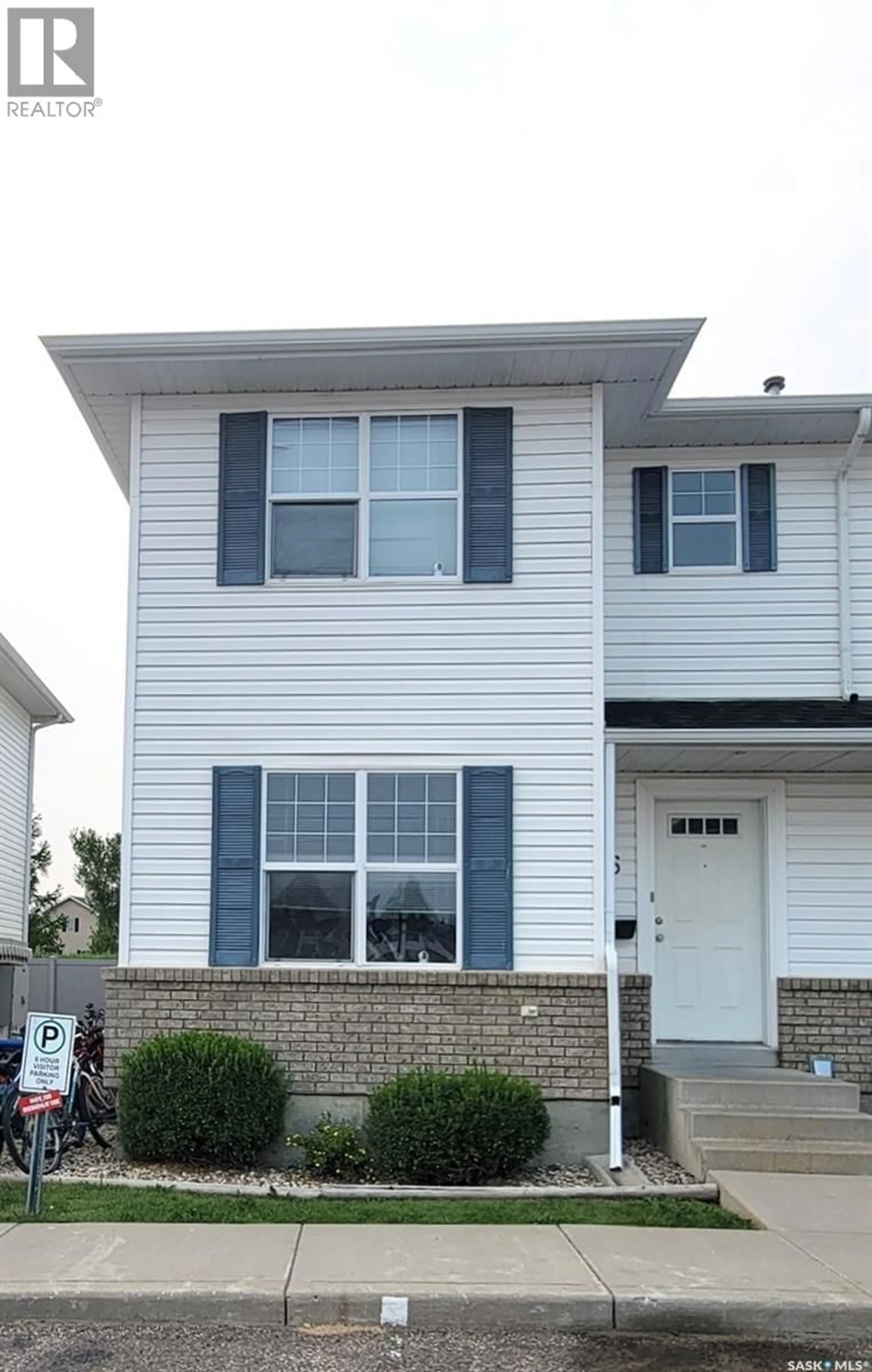 Home with vinyl exterior material, street for 86 203 HEROLD TERRACE, Saskatoon Saskatchewan S7V1H6