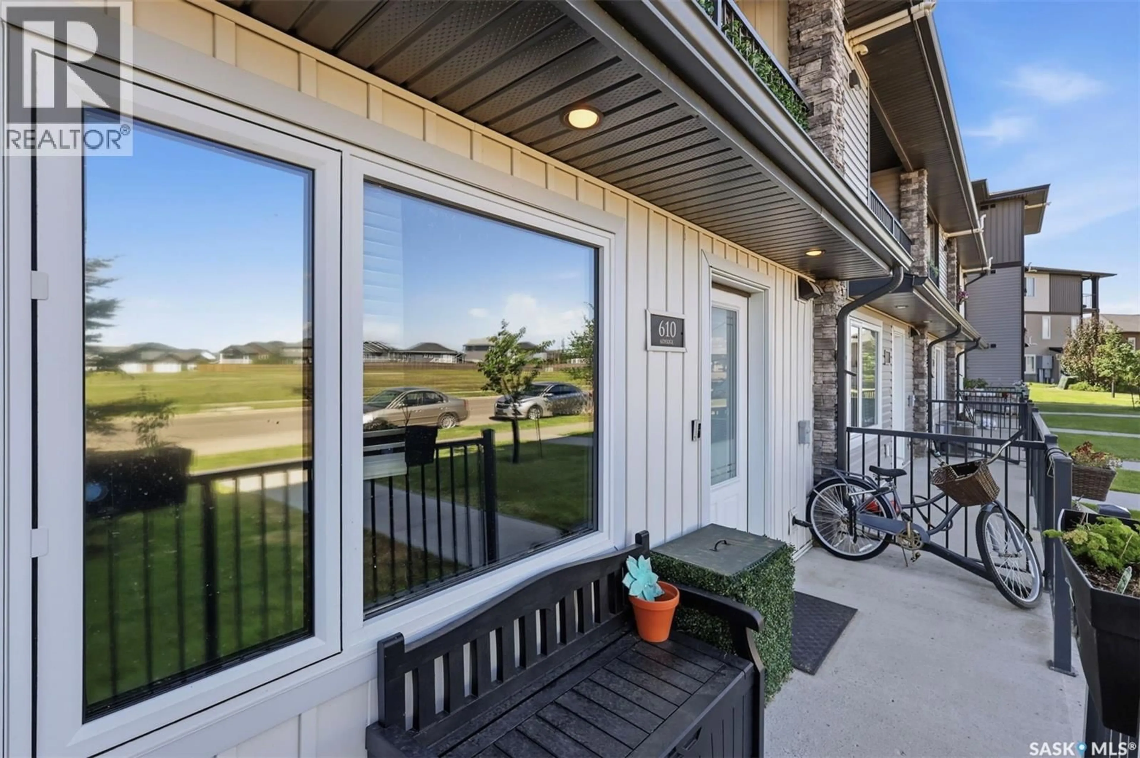 Patio, water/lake/river/ocean view for 610 BALTZAN BOULEVARD, Saskatoon Saskatchewan S7W0X5