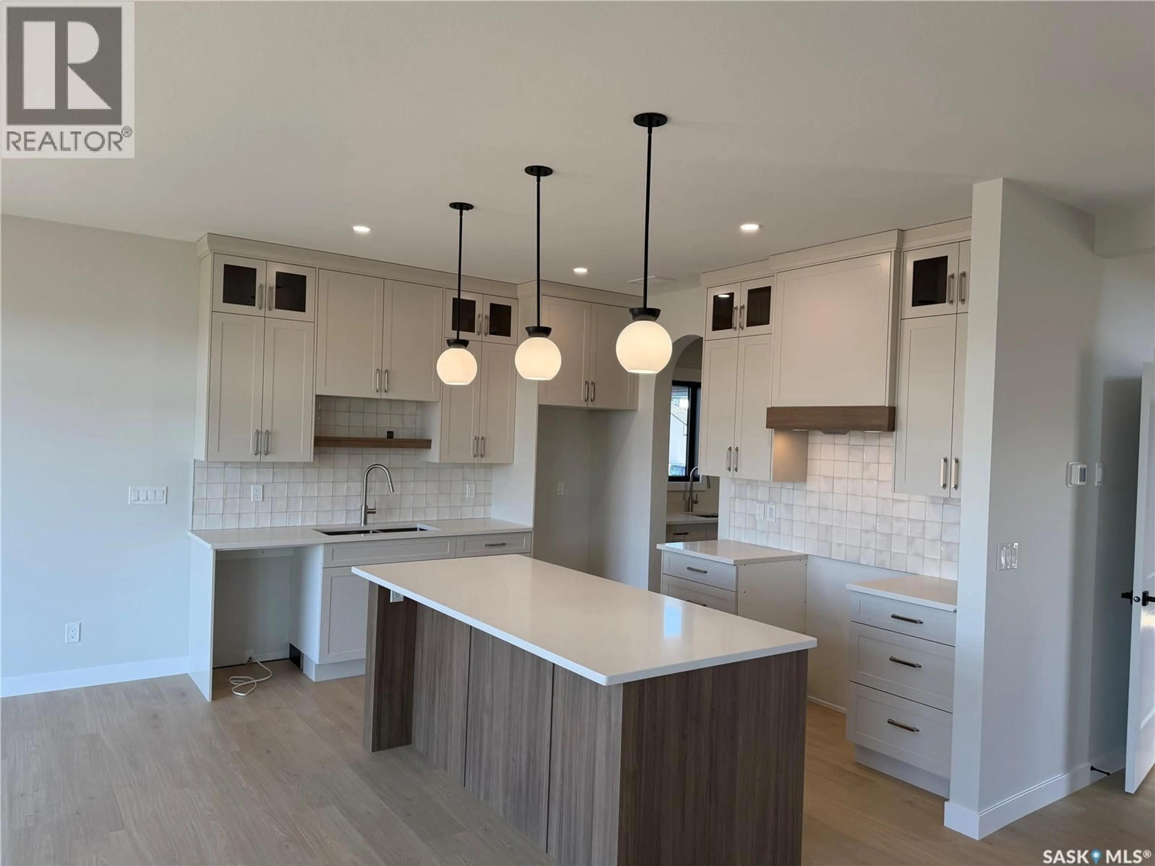 Open concept kitchen, unknown for 322 TRAEGER MANOR, Saskatoon Saskatchewan S7N4V6