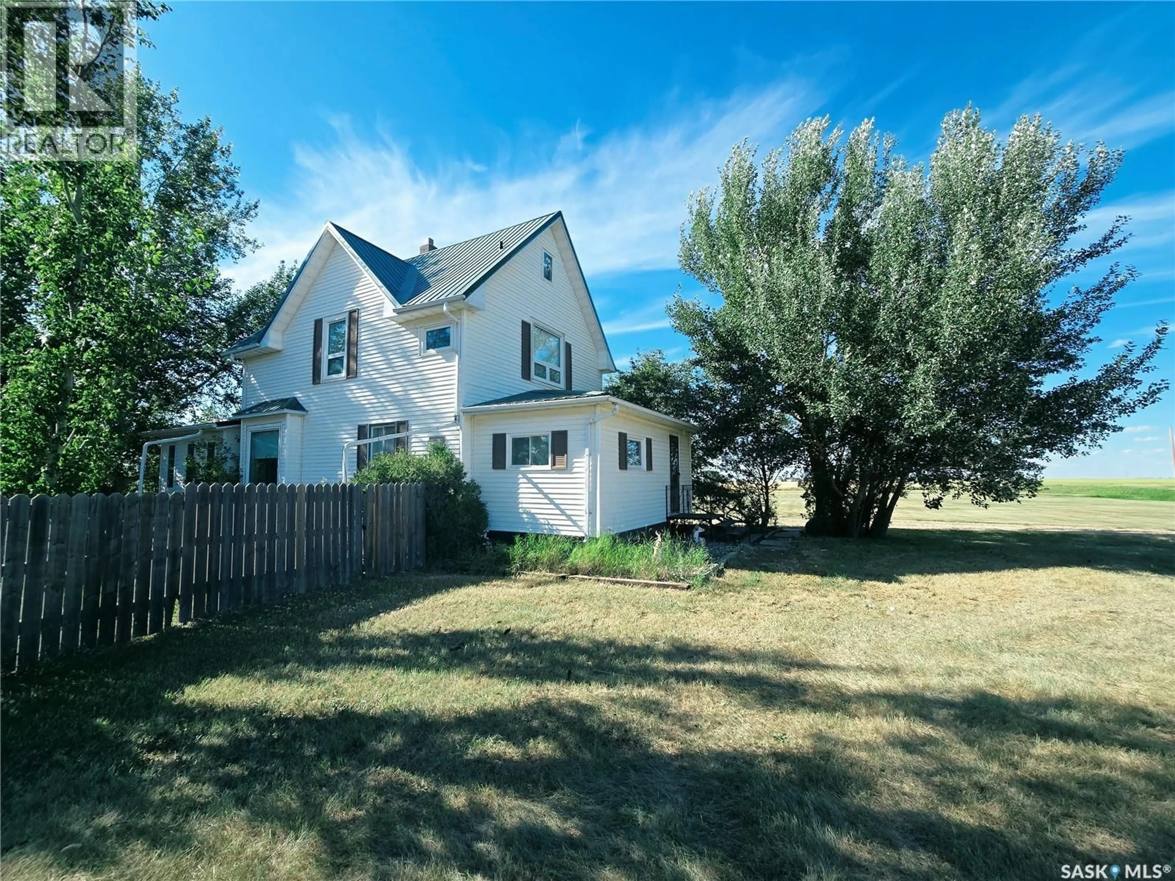 A pic from outside/outdoor area/front of a property/back of a property/a pic from drone, street for MCCORMICK ACREAGE, Weyburn Rm No. 67 Saskatchewan S4H2K7