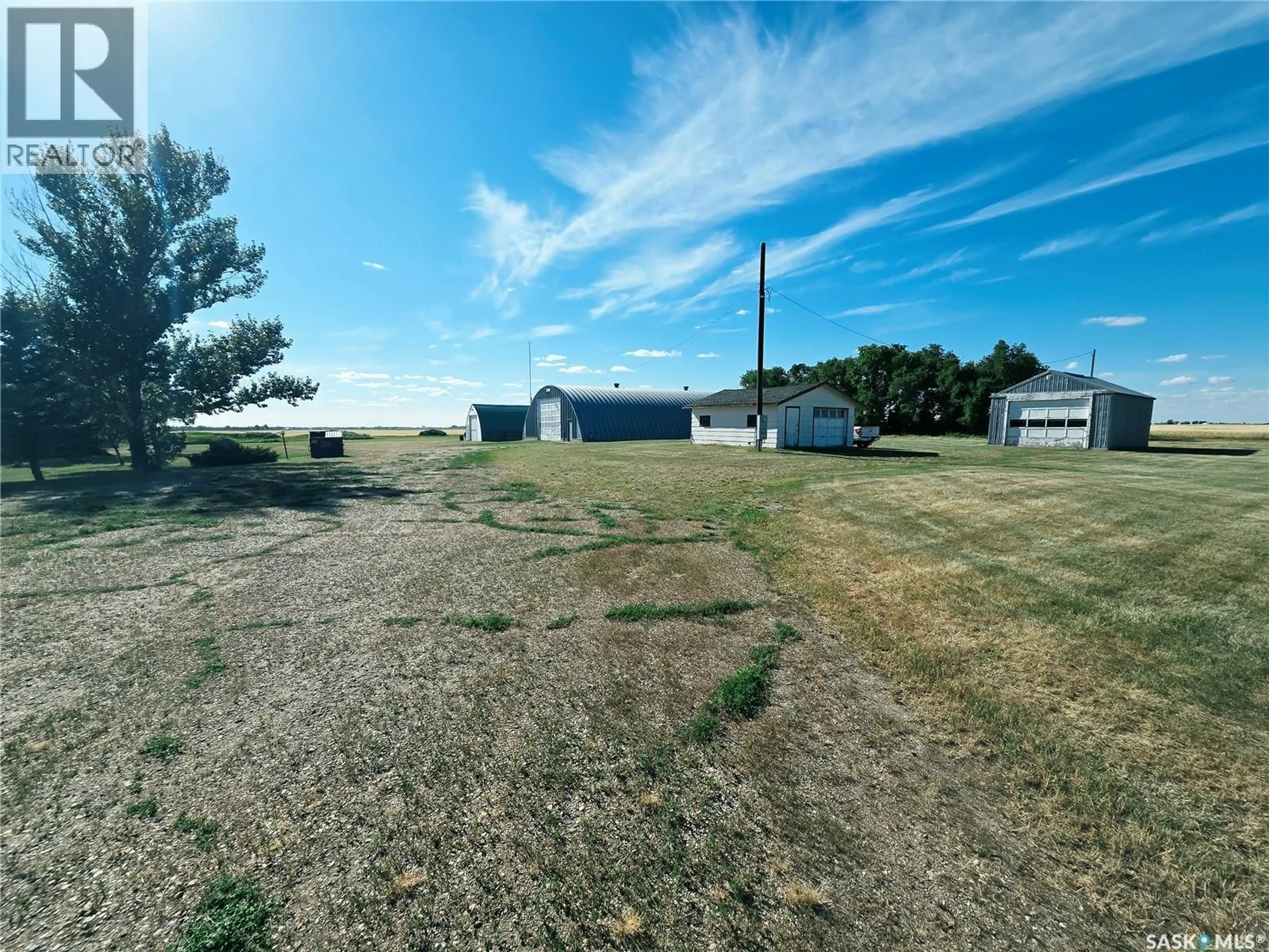 A pic from outside/outdoor area/front of a property/back of a property/a pic from drone, unknown for MCCORMICK ACREAGE, Weyburn Rm No. 67 Saskatchewan S4H2K7