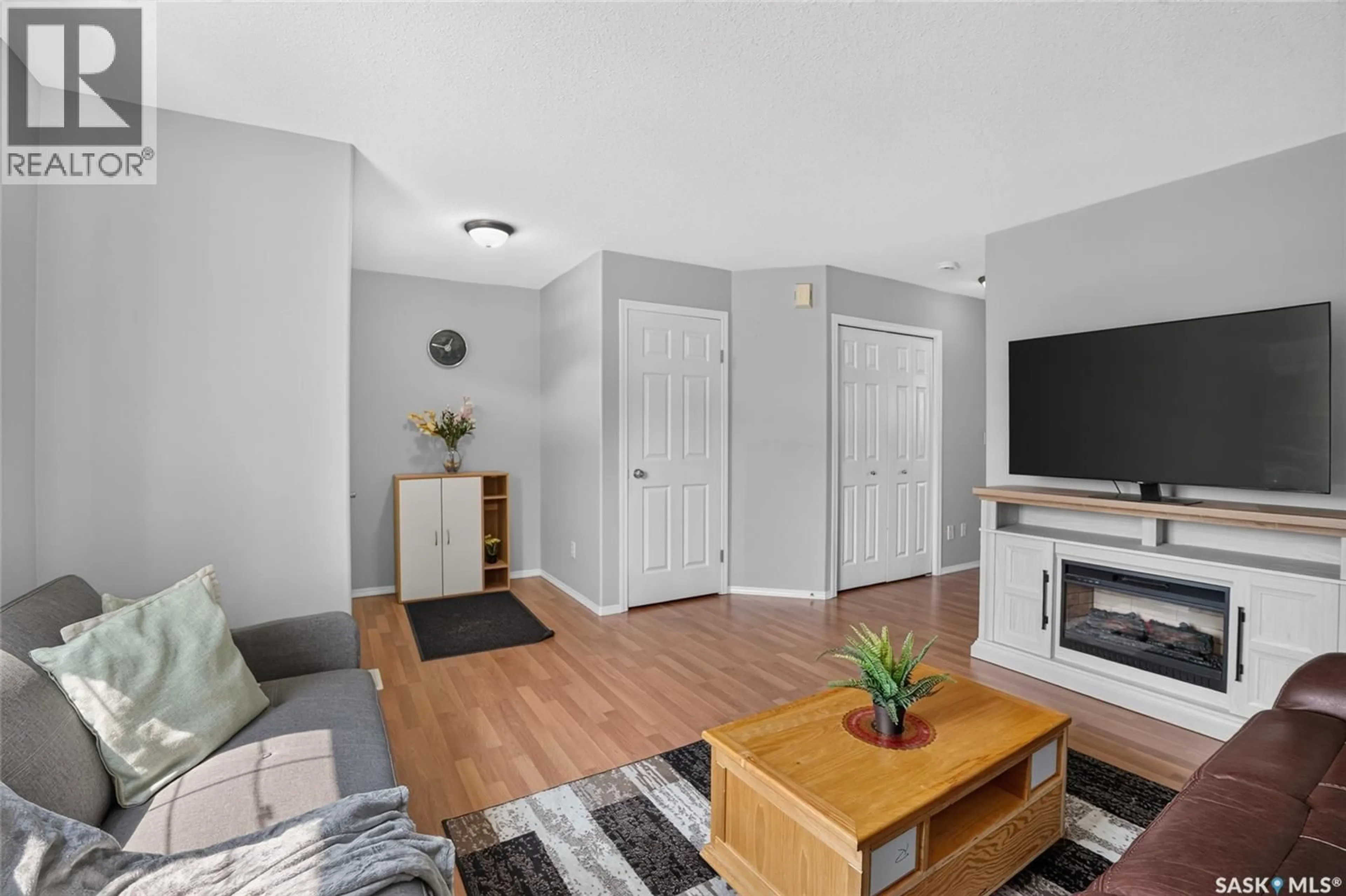 Living room with furniture, unknown for 102 - 13 PAWLYCHENKO LANE, Saskatoon Saskatchewan S7V1G9