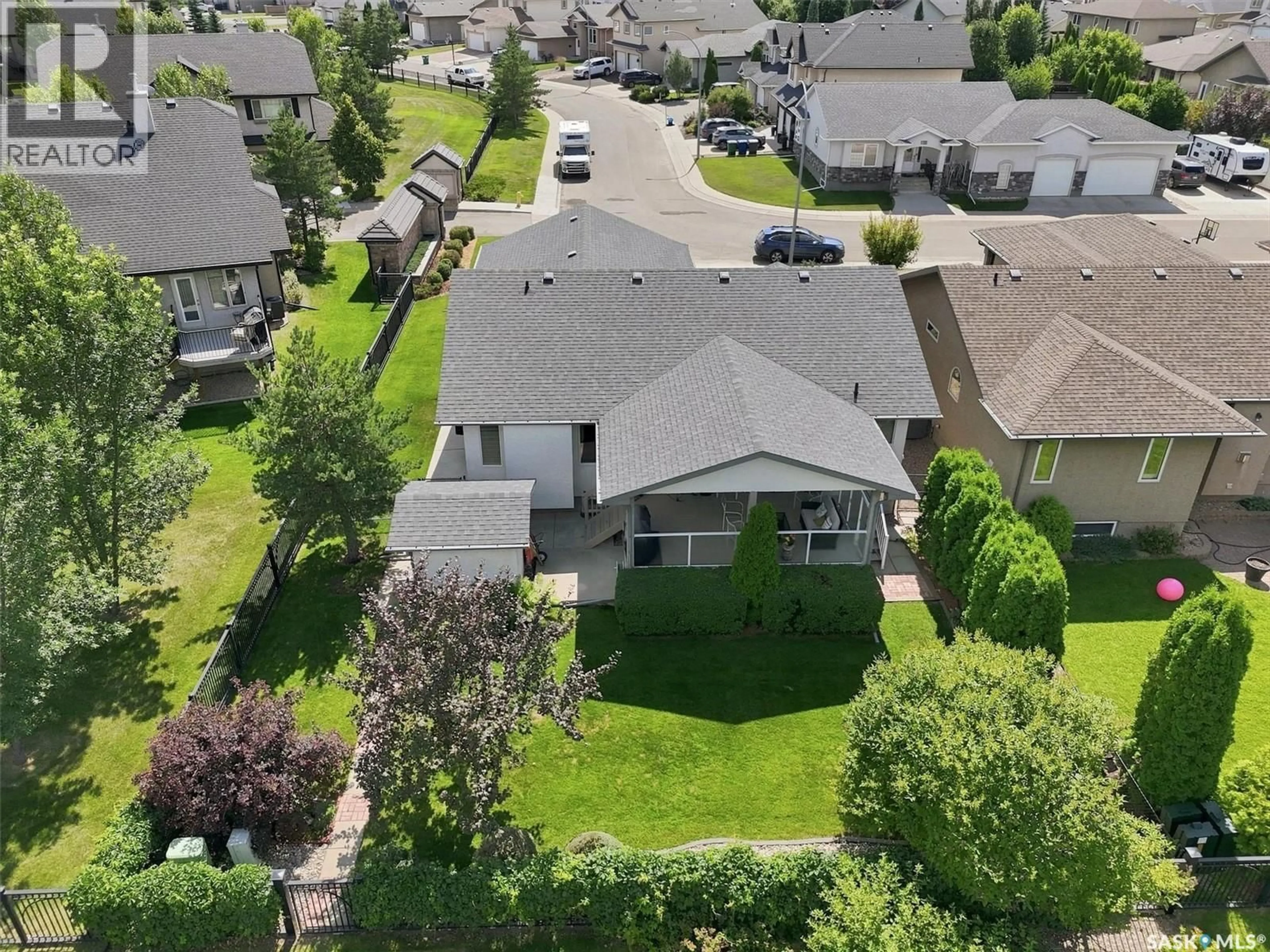 A pic from outside/outdoor area/front of a property/back of a property/a pic from drone, street for 226 BROOKDALE CRESCENT, Saskatoon Saskatchewan S7V1K5