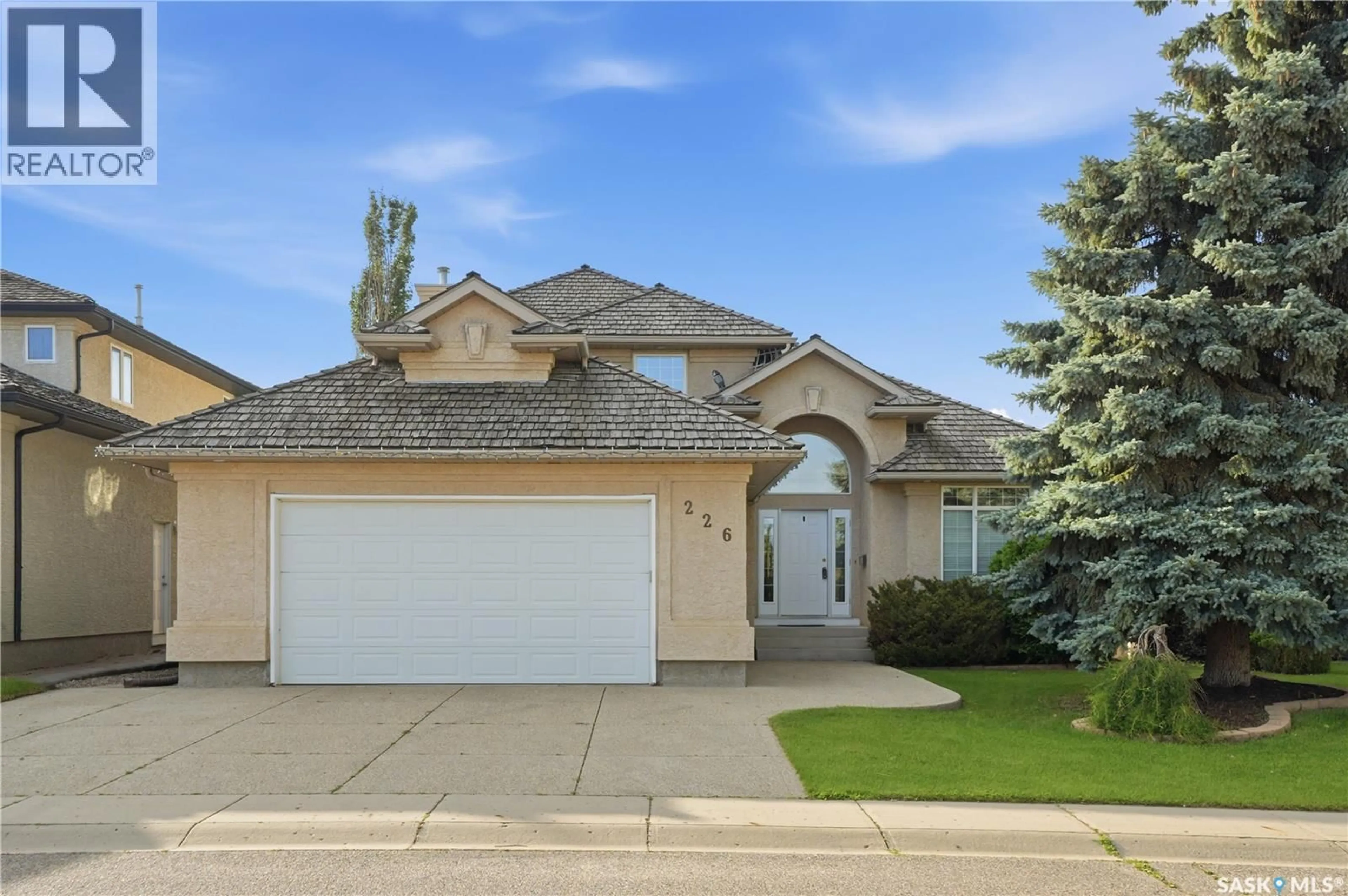 Home with vinyl exterior material, street for 226 HORLICK CRESCENT, Saskatoon Saskatchewan S7N4R5