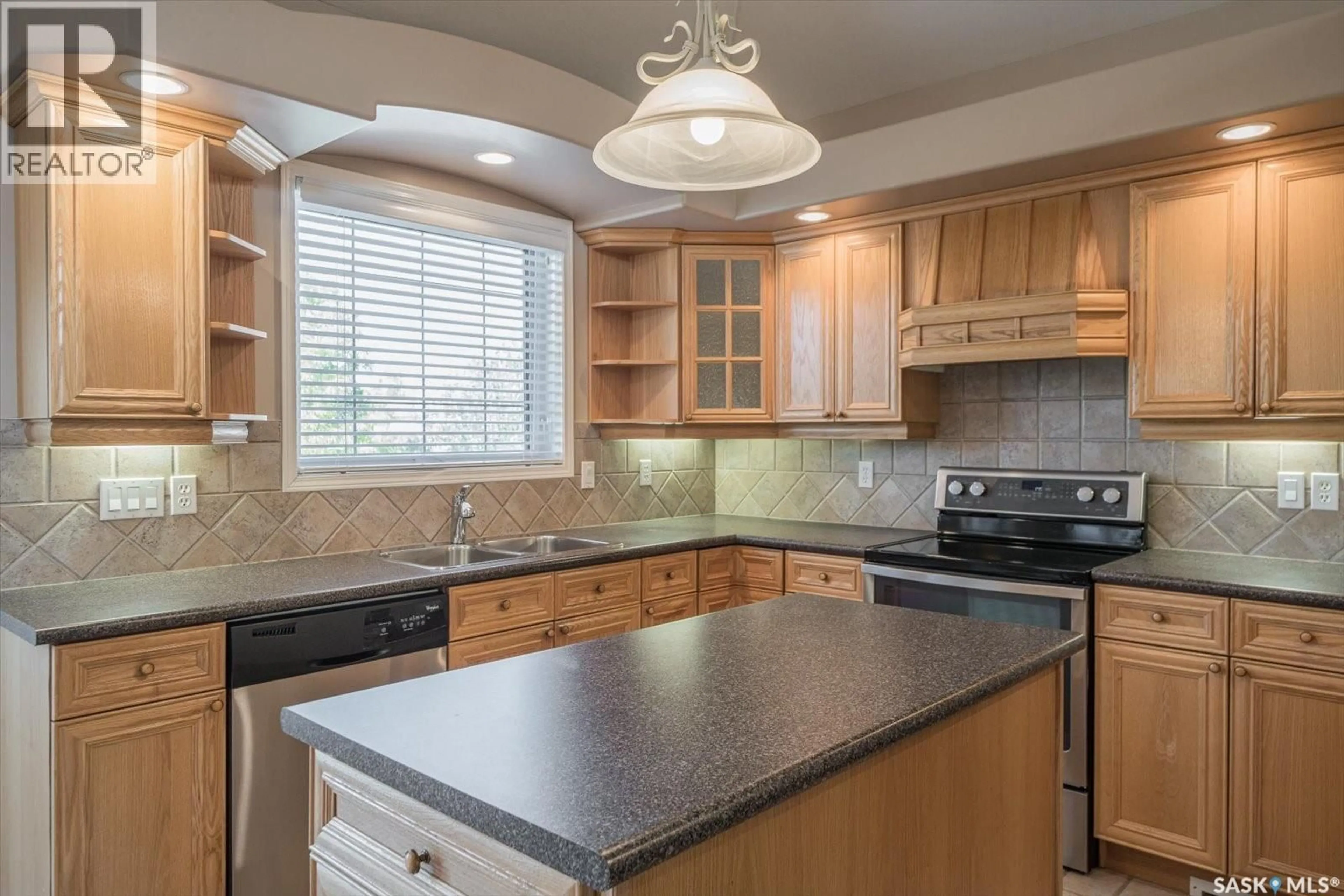 Open concept kitchen, ceramic/tile floor for 226 HORLICK CRESCENT, Saskatoon Saskatchewan S7N4R5