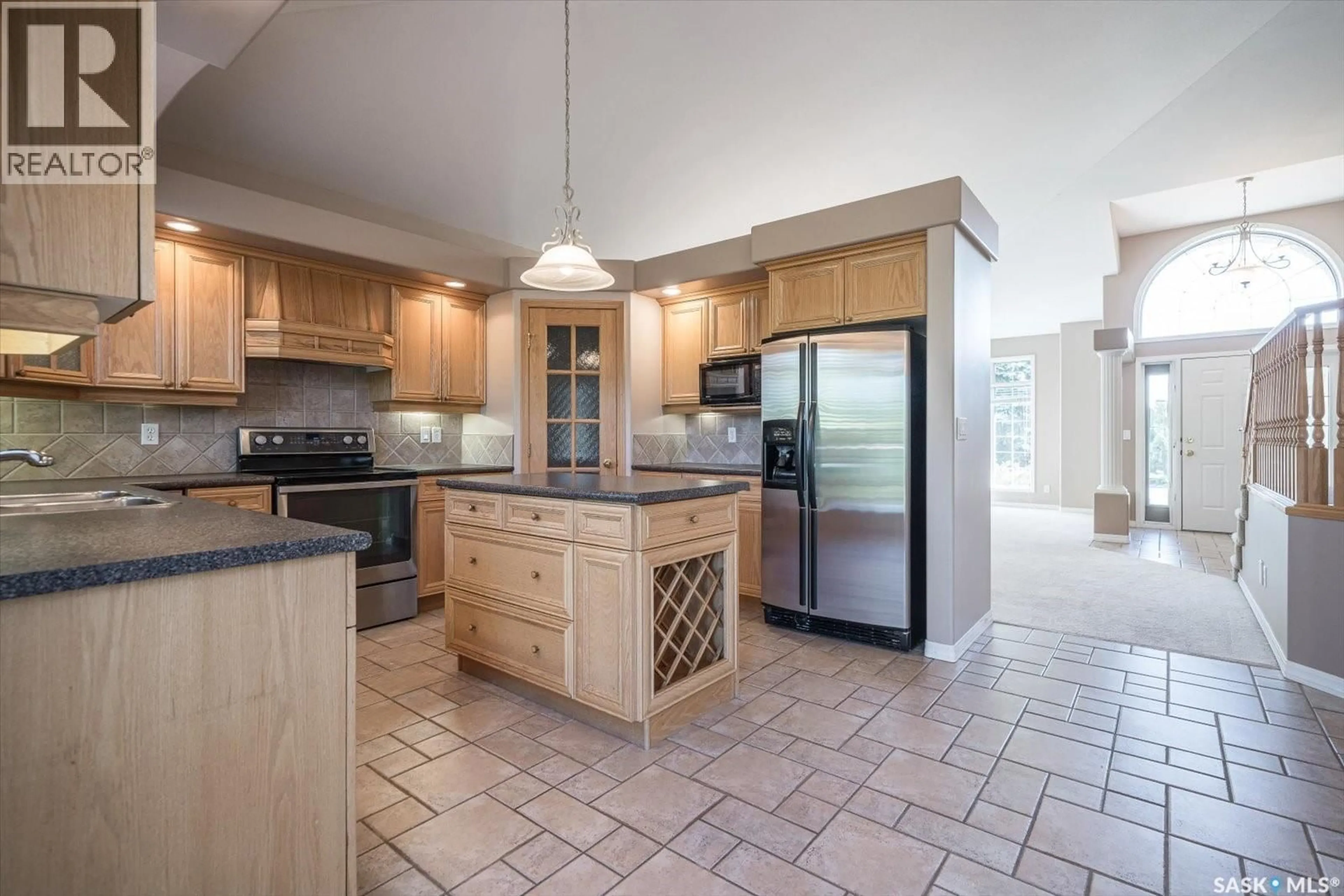 Open concept kitchen, ceramic/tile floor for 226 HORLICK CRESCENT, Saskatoon Saskatchewan S7N4R5