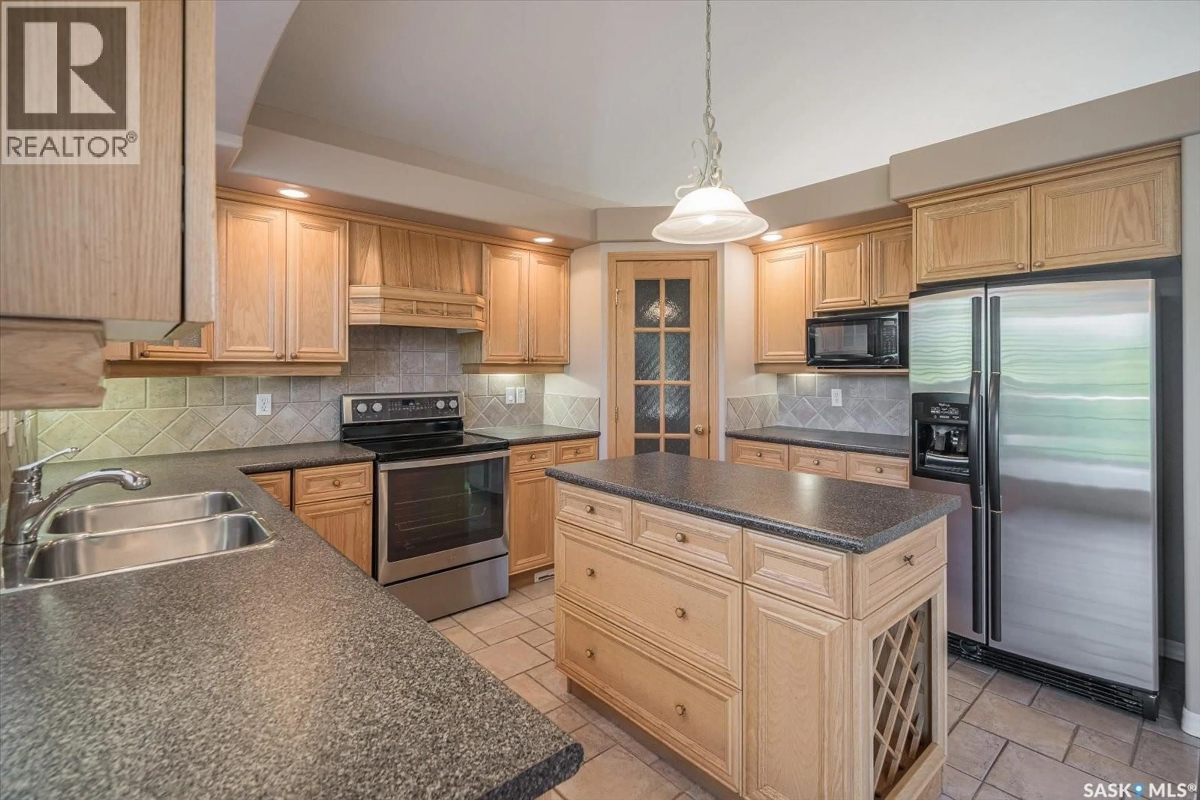 Open concept kitchen, ceramic/tile floor for 226 HORLICK CRESCENT, Saskatoon Saskatchewan S7N4R5