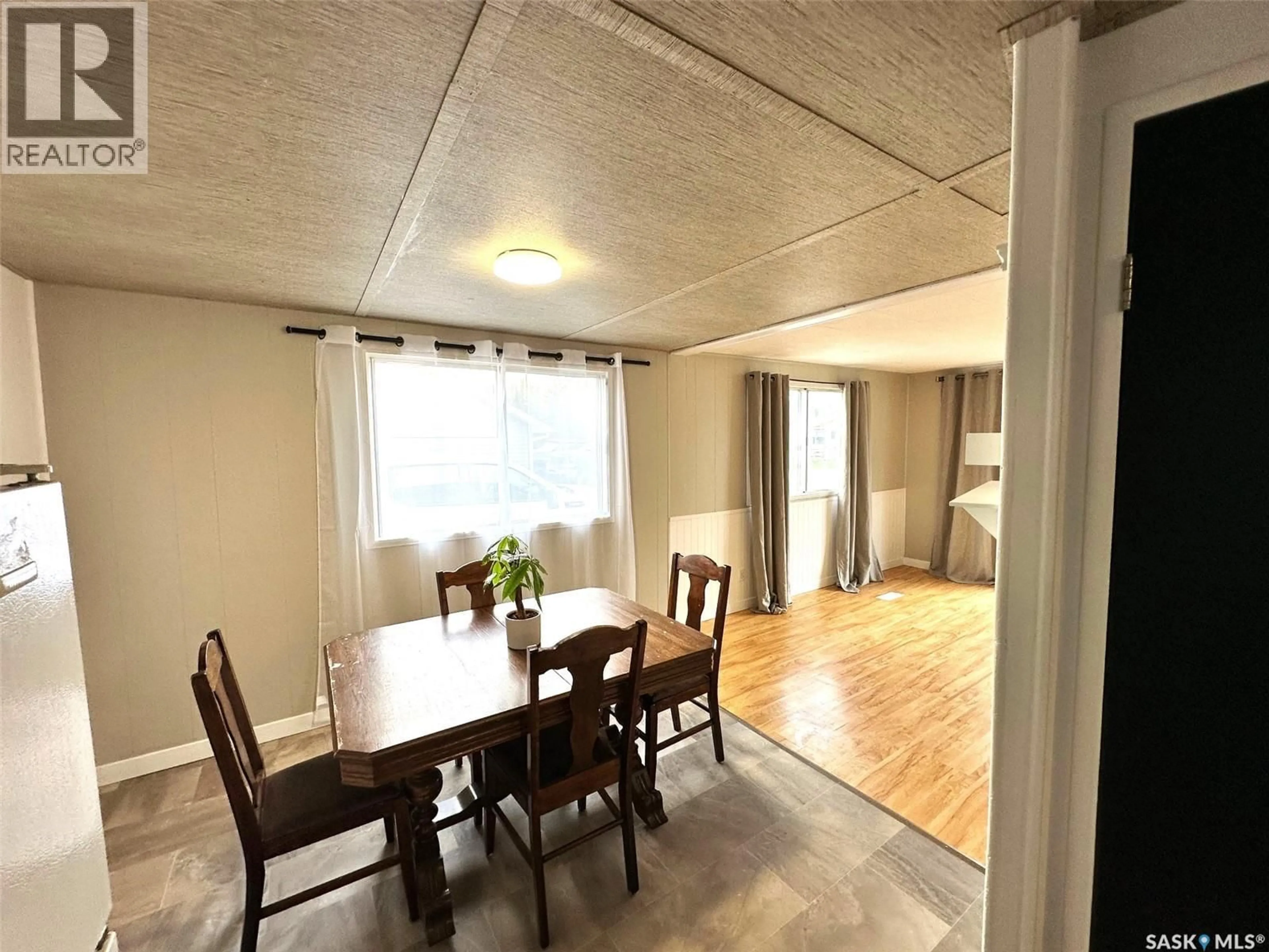Dining room, wood/laminate floor for 313 HARA AVENUE, Bjorkdale Saskatchewan S0E0Y0