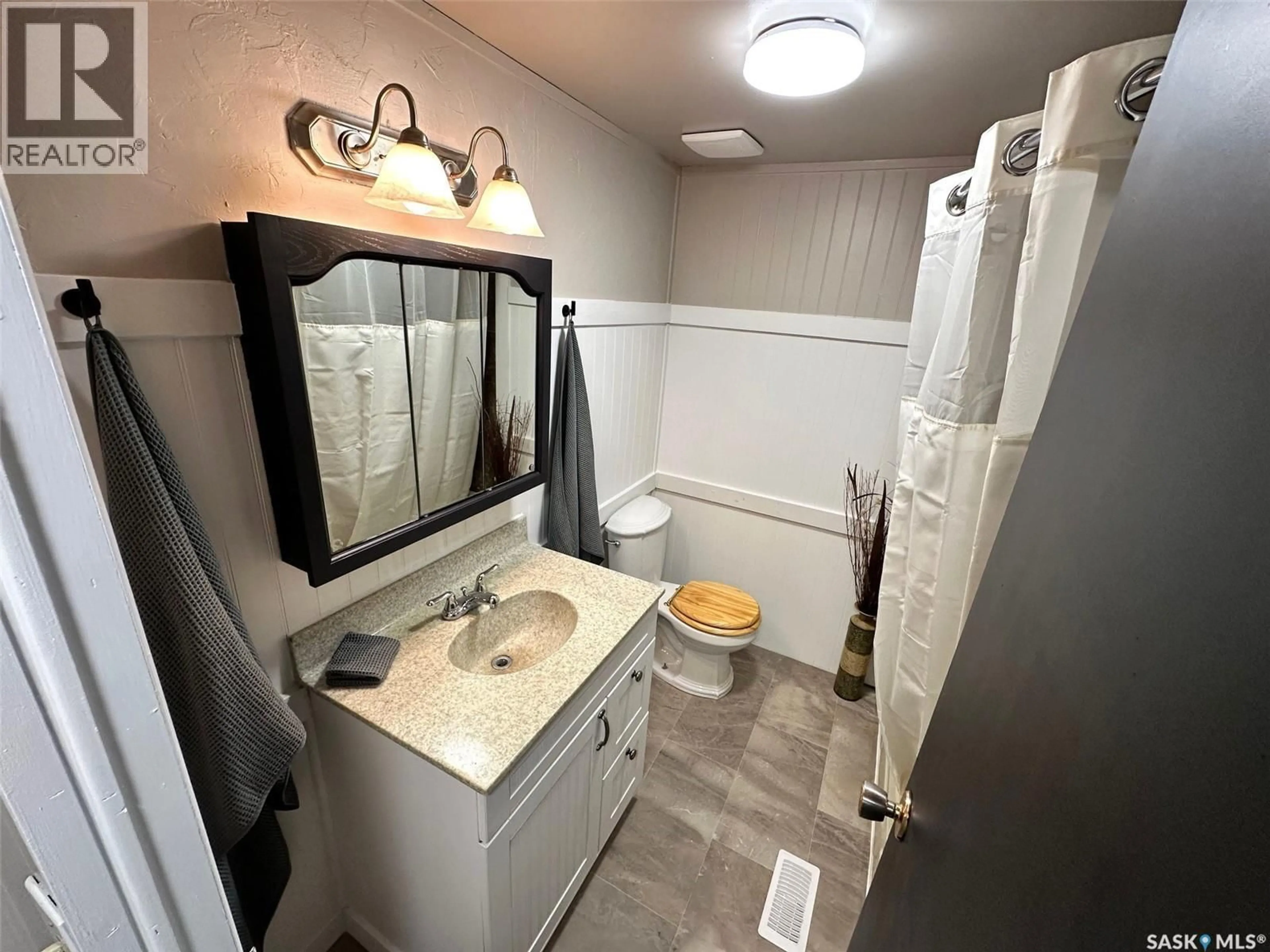 Standard bathroom, ceramic/tile floor for 313 HARA AVENUE, Bjorkdale Saskatchewan S0E0Y0