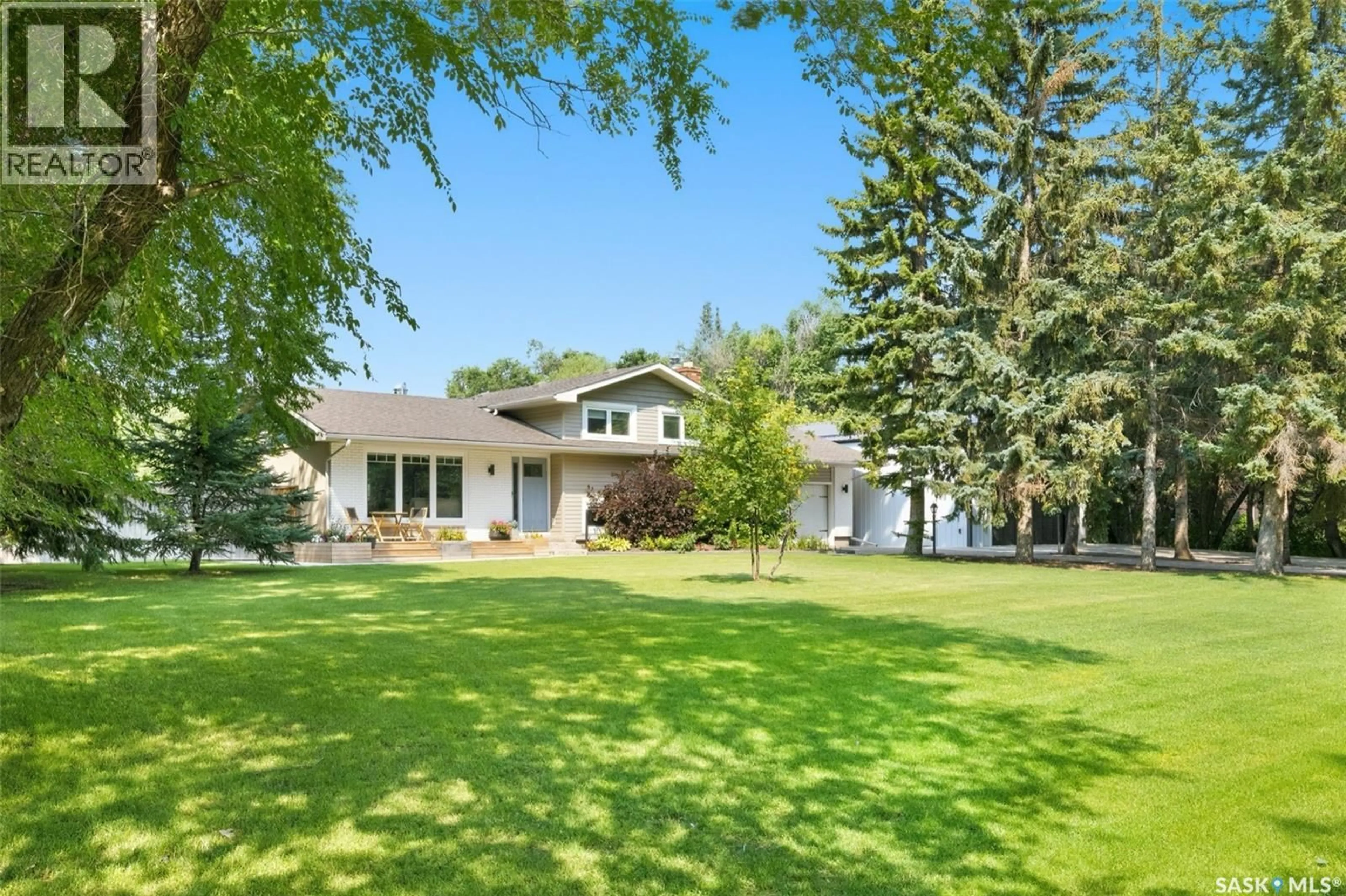 A pic from outside/outdoor area/front of a property/back of a property/a pic from drone, water/lake/river/ocean view for 35 RIDGEDALE BAY, White City Saskatchewan S4L1B2