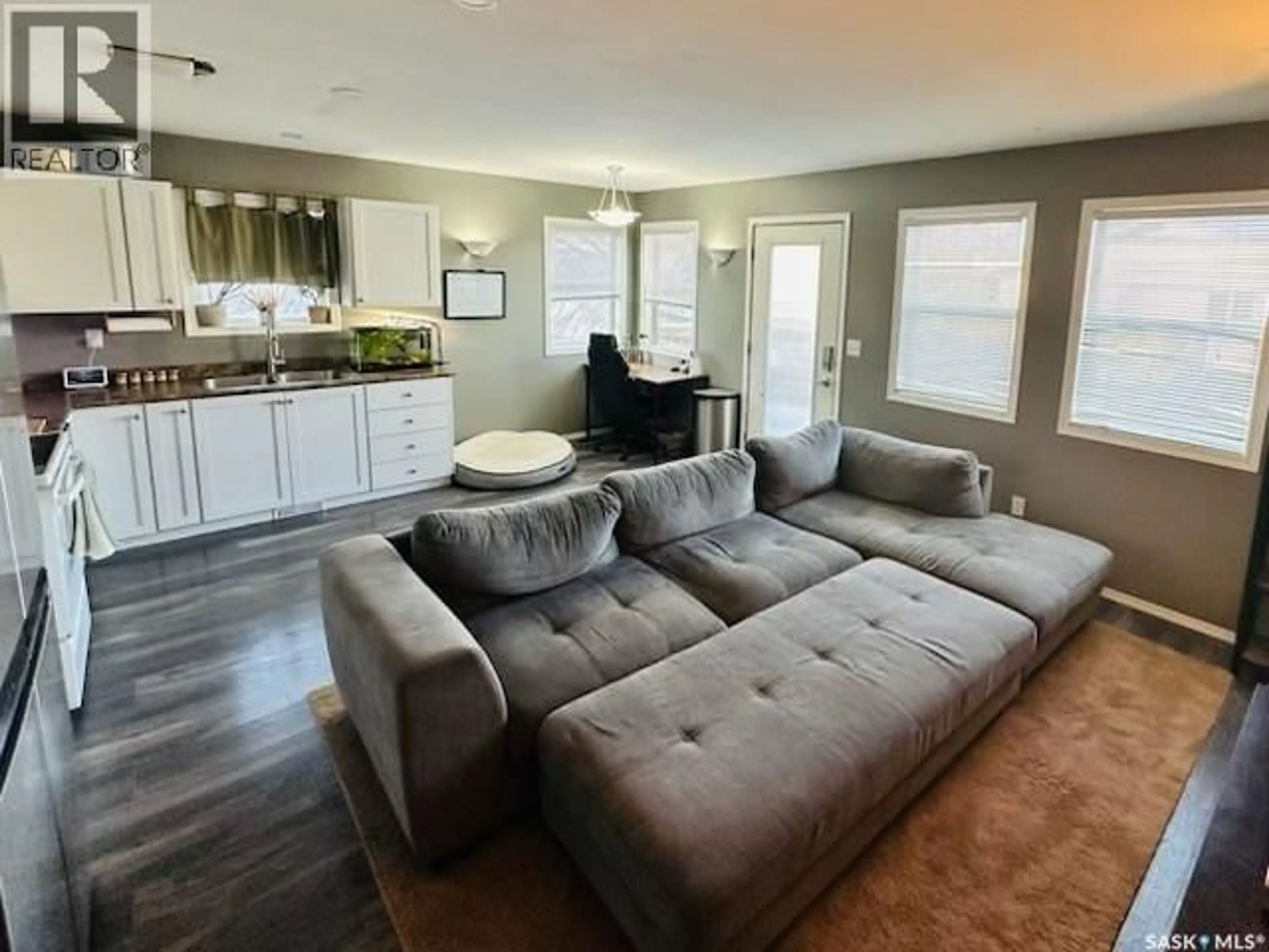 Living room with furniture, unknown for 1804 BELFAST AVENUE, Saskatoon Saskatchewan S7M0L8