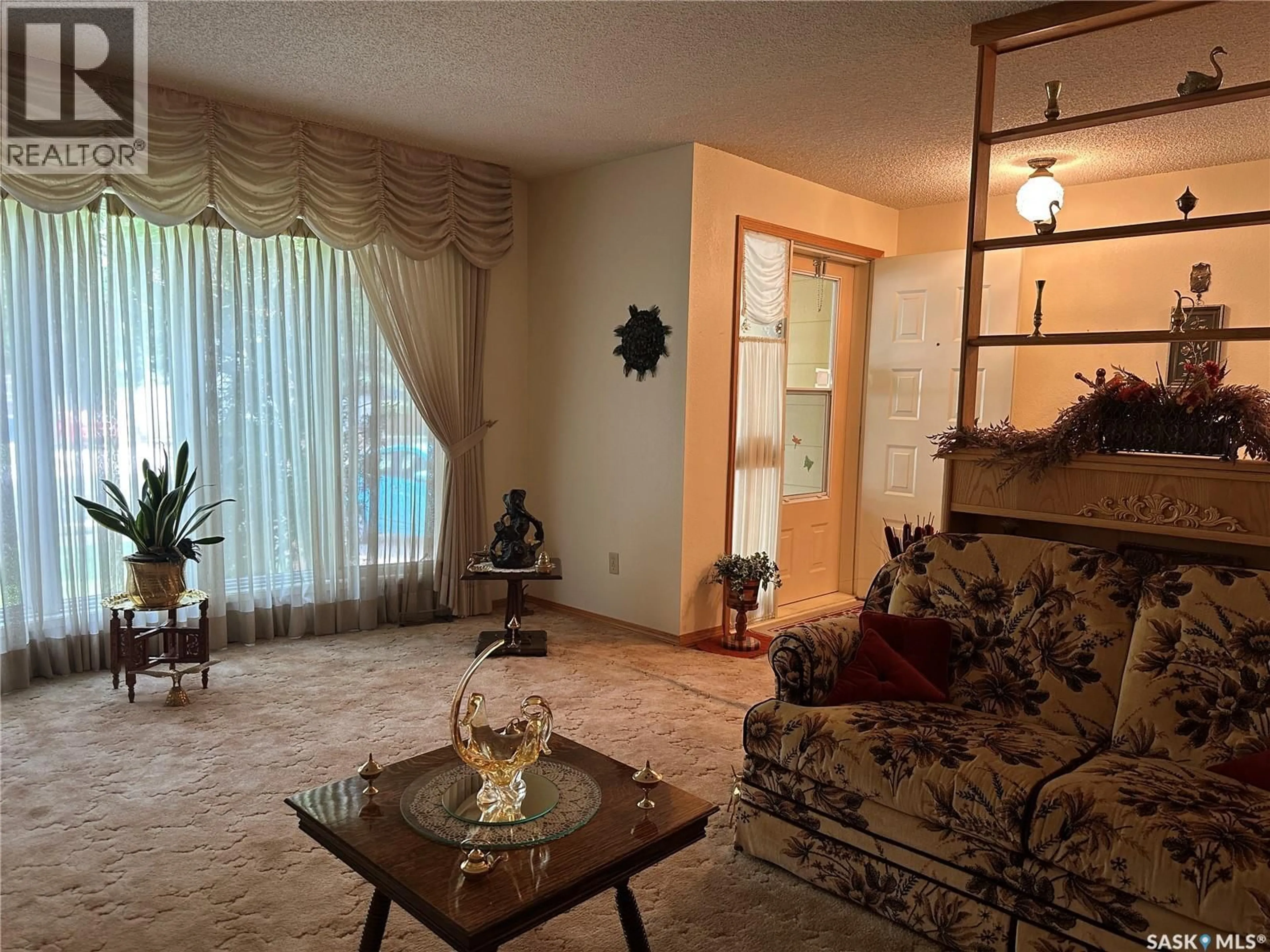 Living room with furniture, unknown for 213 5TH STREET, Weyburn Saskatchewan S4H0Z4
