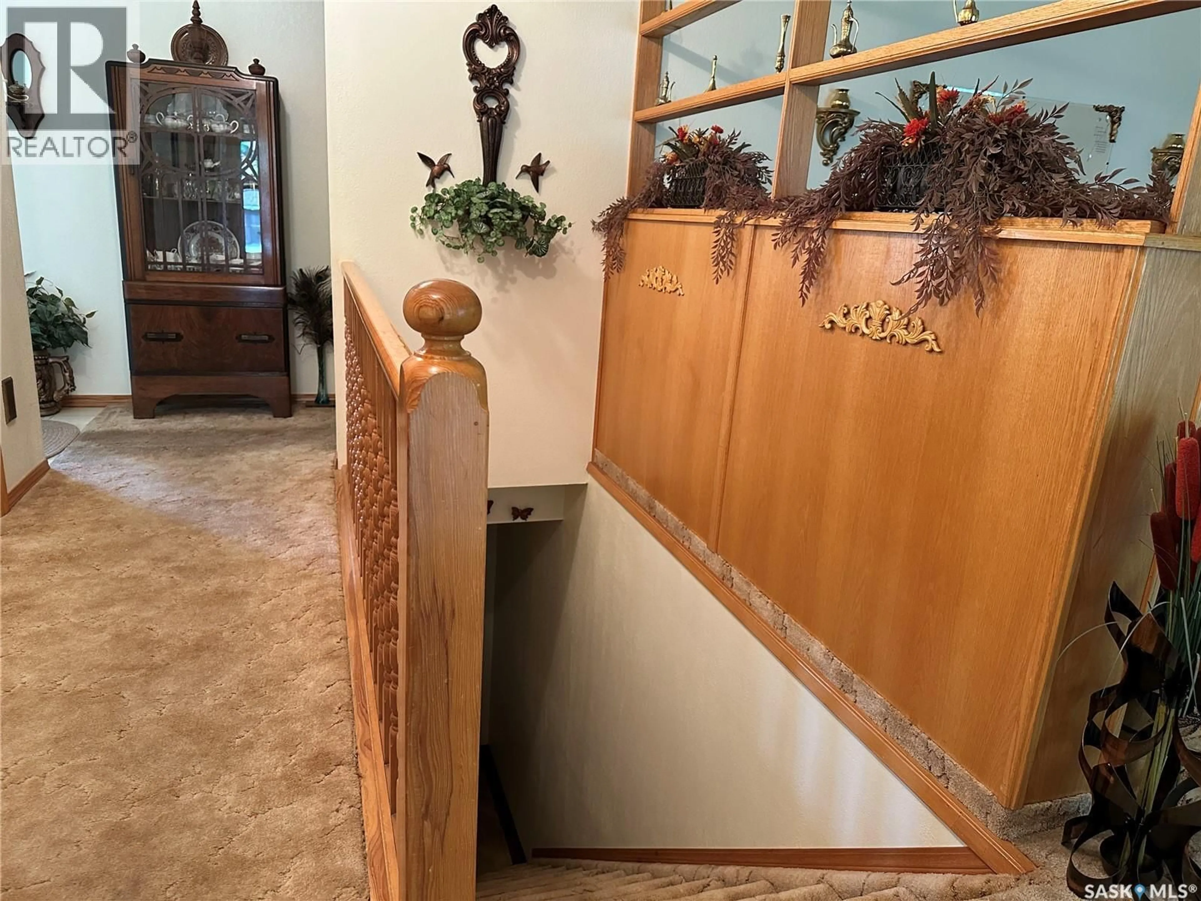 Indoor foyer for 213 5TH STREET, Weyburn Saskatchewan S4H0Z4