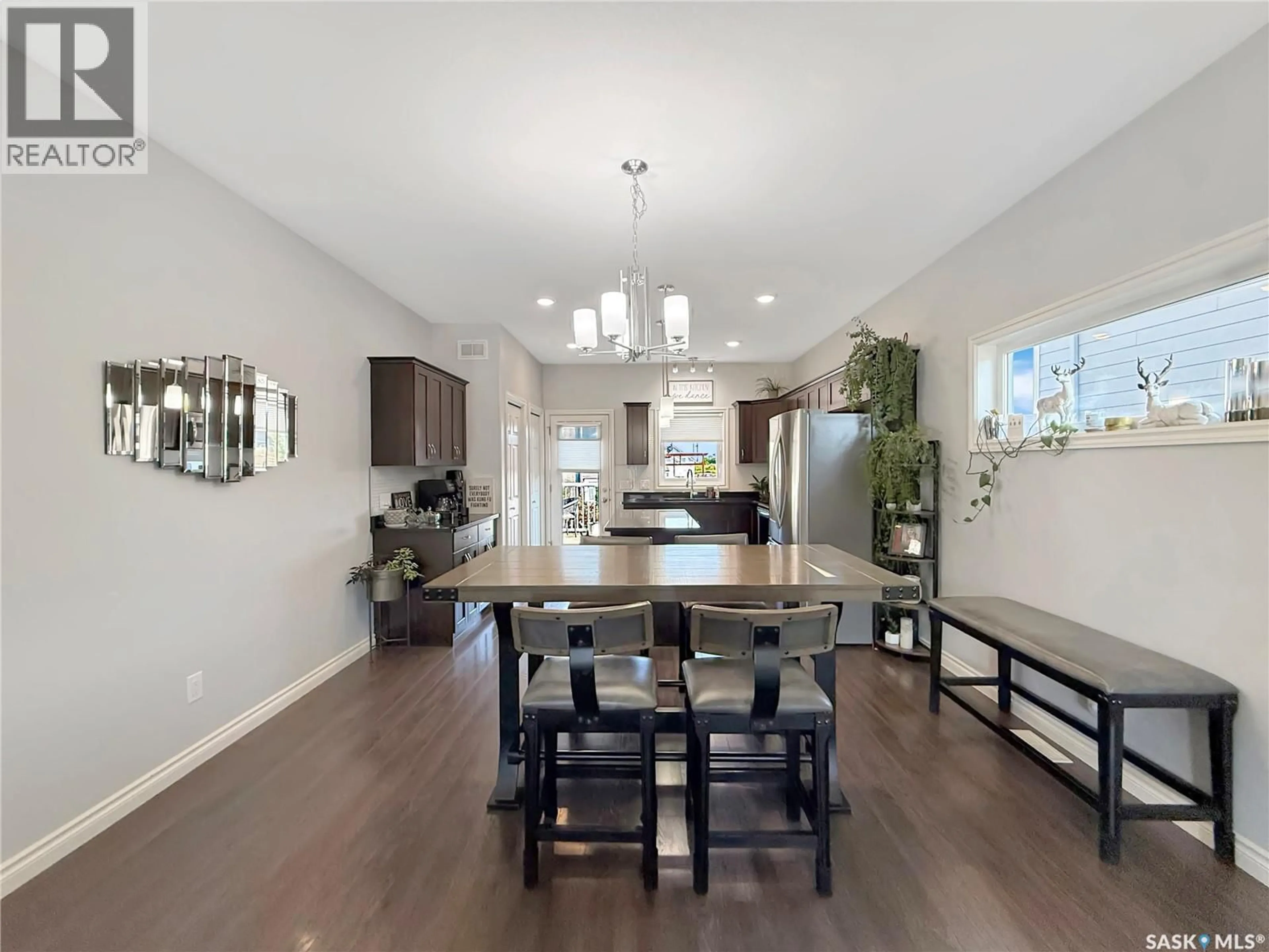 Open concept kitchen, wood/laminate floor for 6 BYARS STREET, Prince Albert Saskatchewan S6X0A4