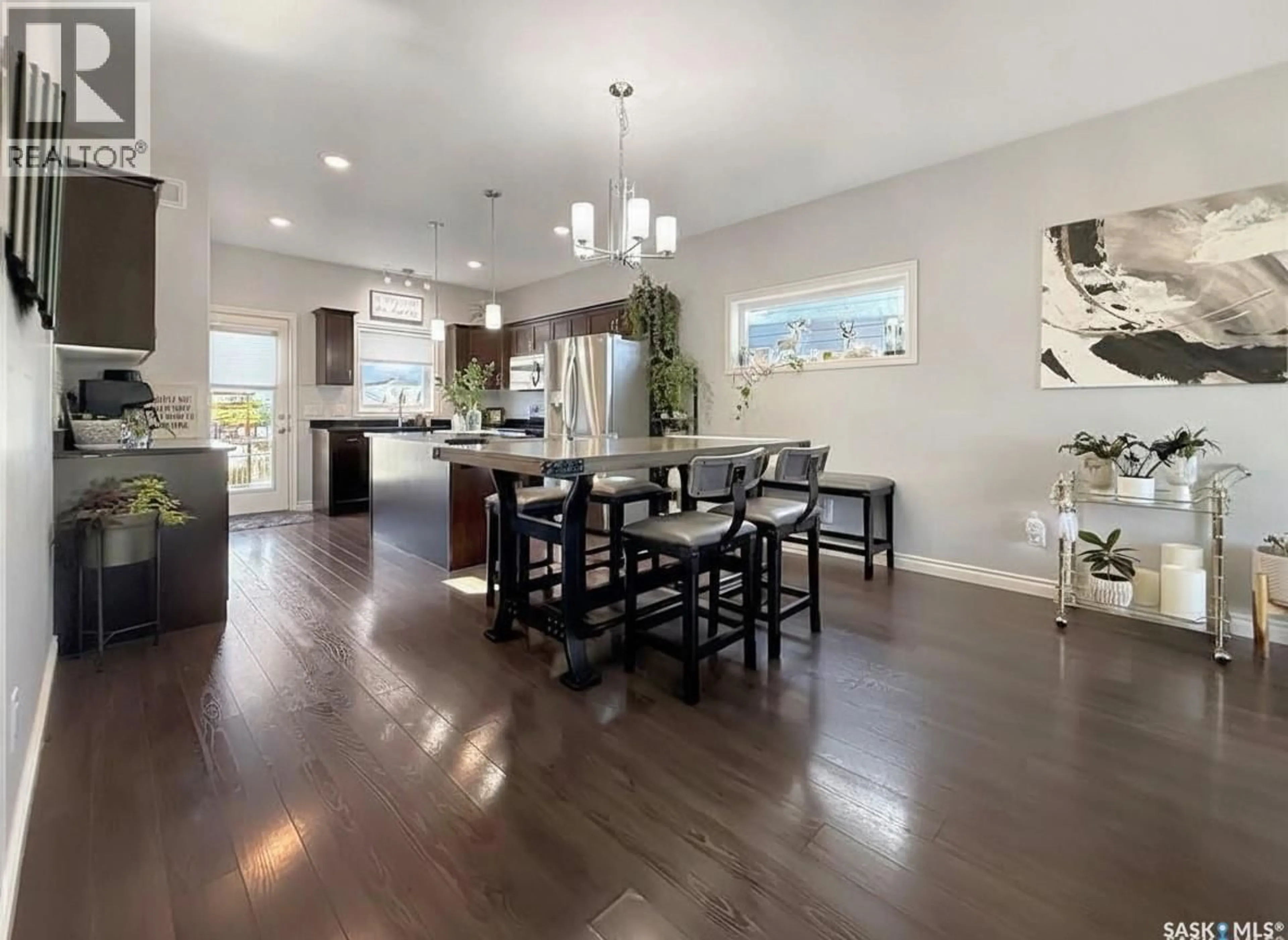 Open concept kitchen, wood/laminate floor for 6 BYARS STREET, Prince Albert Saskatchewan S6X0A4