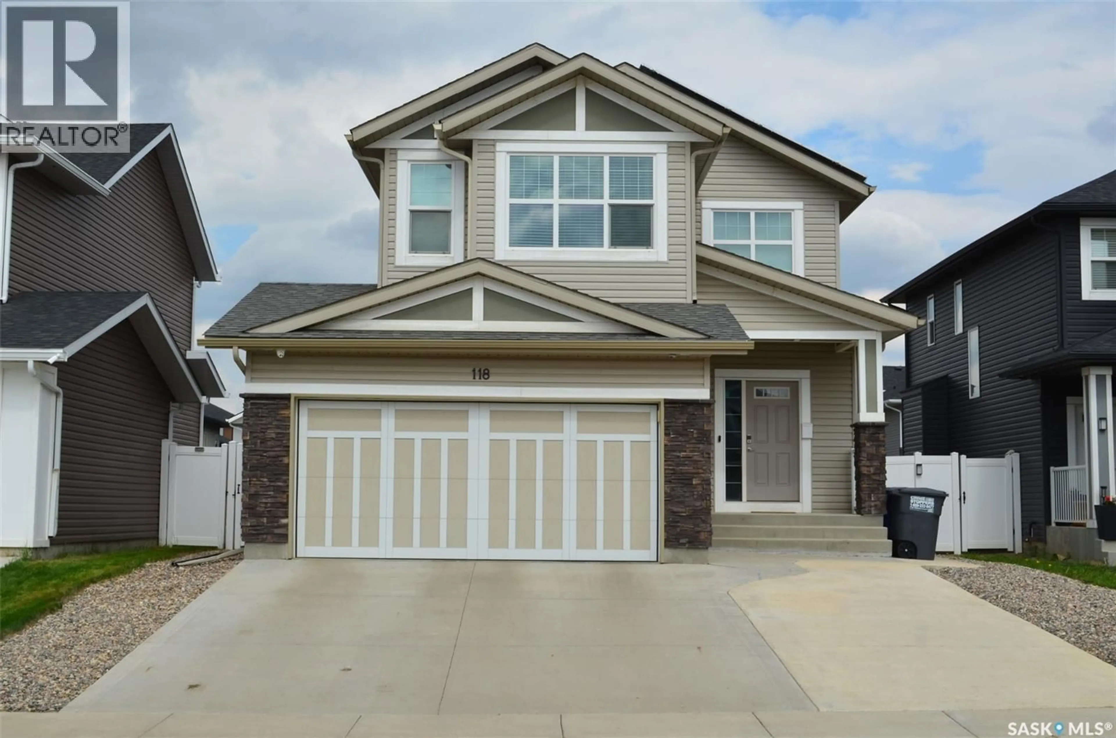 Home with vinyl exterior material, street for 118 STROMBERG CRESCENT, Saskatoon Saskatchewan S7L6M9