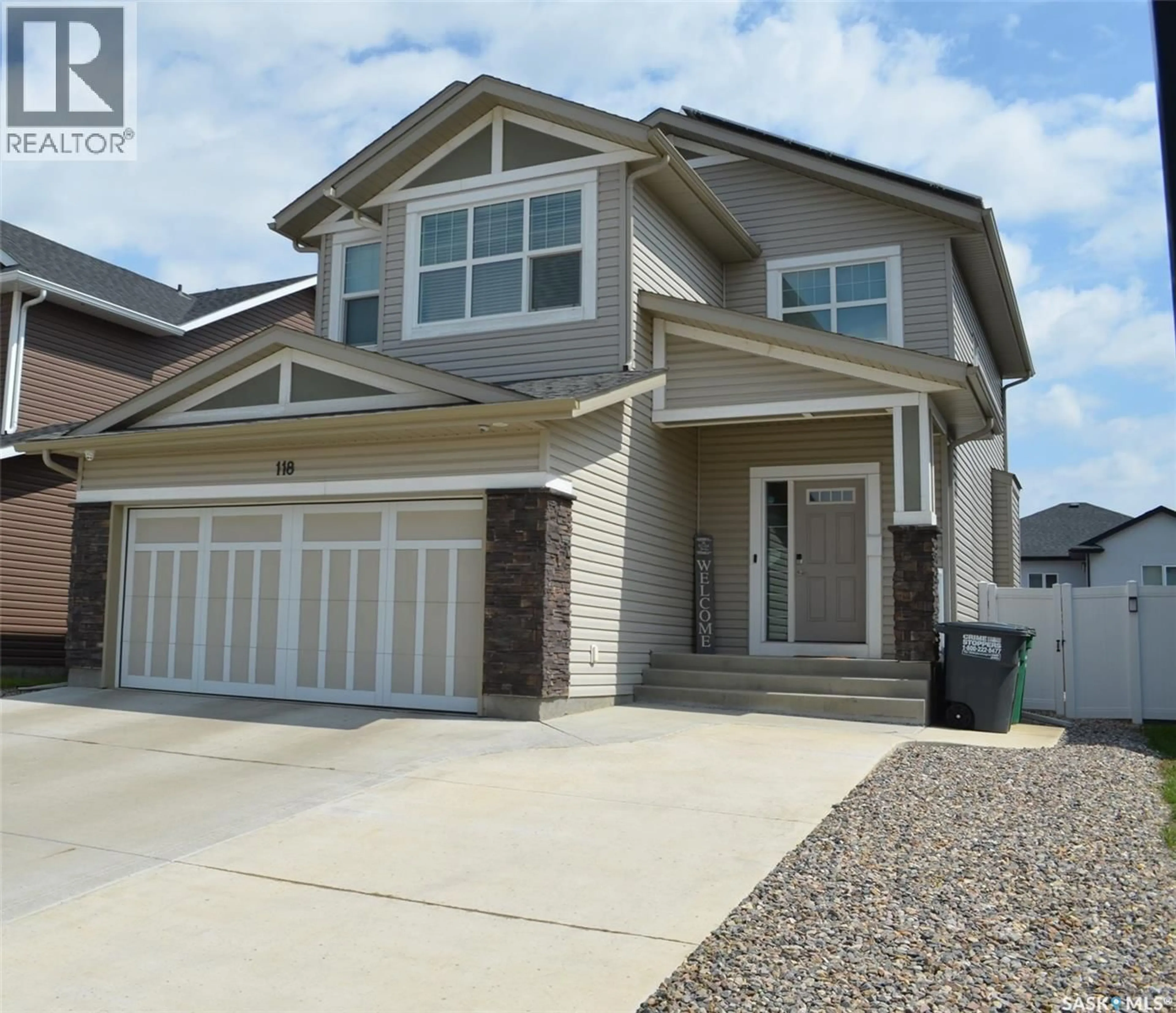 Home with vinyl exterior material, street for 118 STROMBERG CRESCENT, Saskatoon Saskatchewan S7L6M9