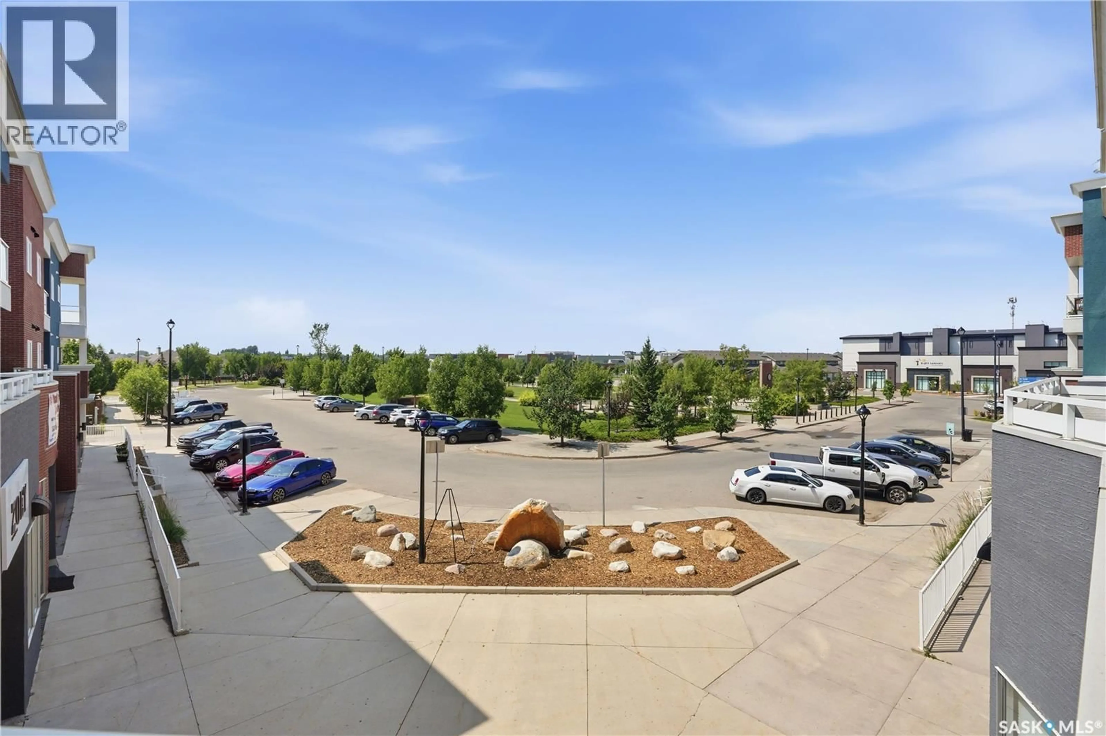 A pic from outside/outdoor area/front of a property/back of a property/a pic from drone, mountain view for 412 - 213 WILLOWGROVE SQUARE, Saskatoon Saskatchewan S7W0T2