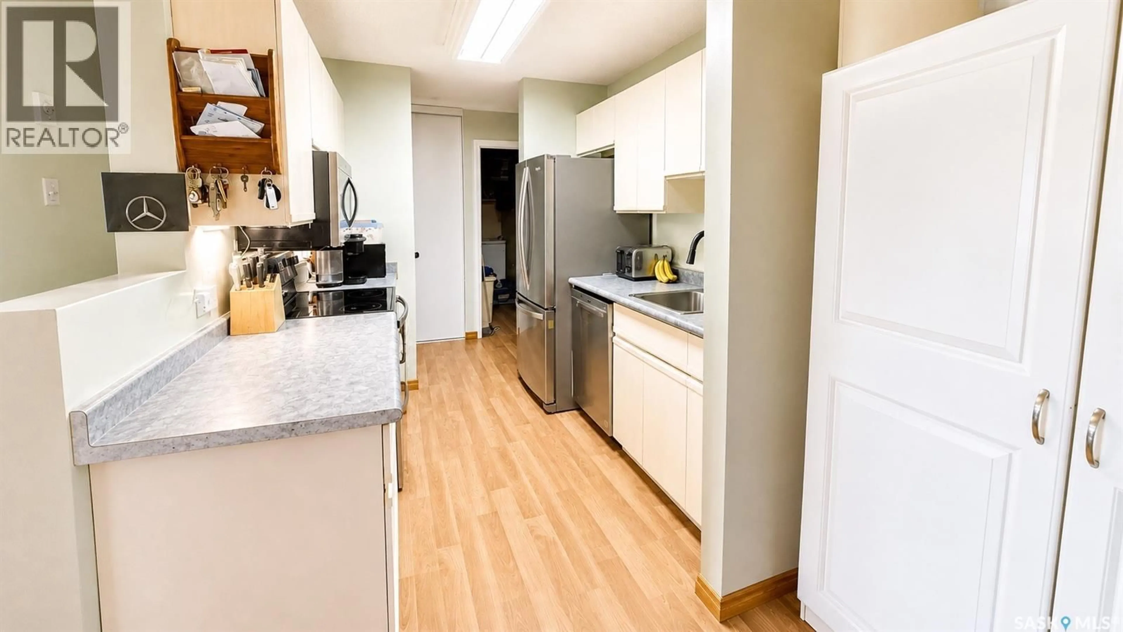 Standard kitchen, wood/laminate floor for 216 3420 PARK STREET, Regina Saskatchewan S4V2M9