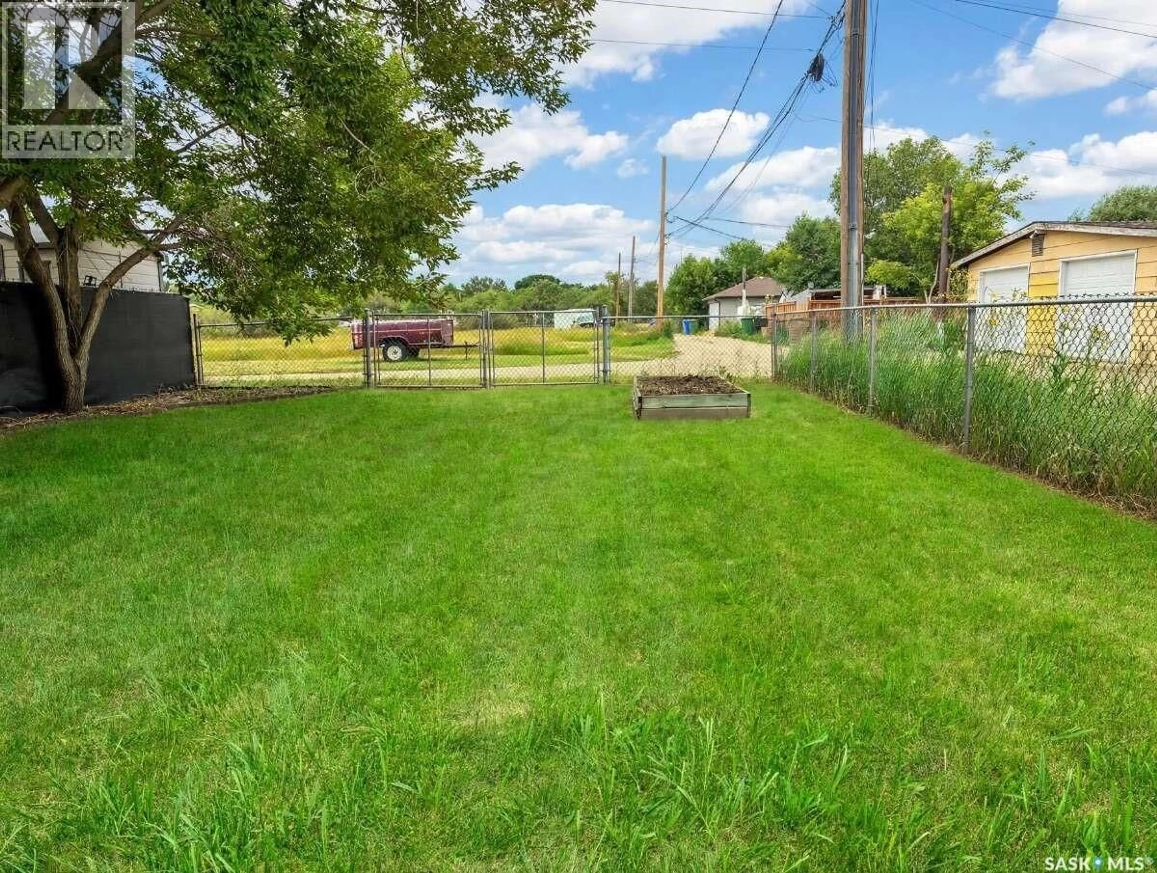 A pic from outside/outdoor area/front of a property/back of a property/a pic from drone, street for 4324 3RD AVENUE, Regina Saskatchewan S4R0X2