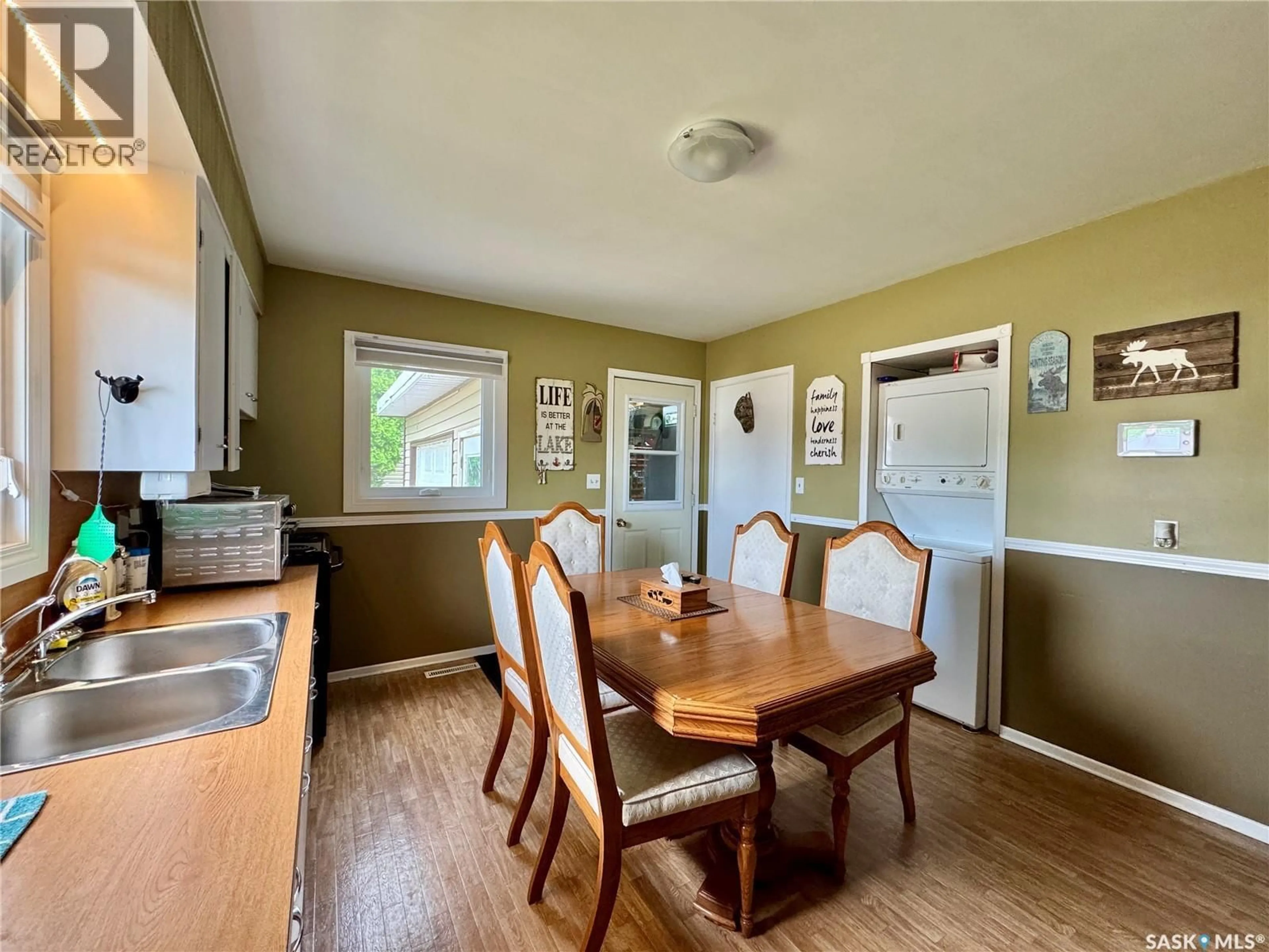 Dining room, wood/laminate floor for 321 VINCENT AVENUE, Churchbridge Saskatchewan S0A0M0