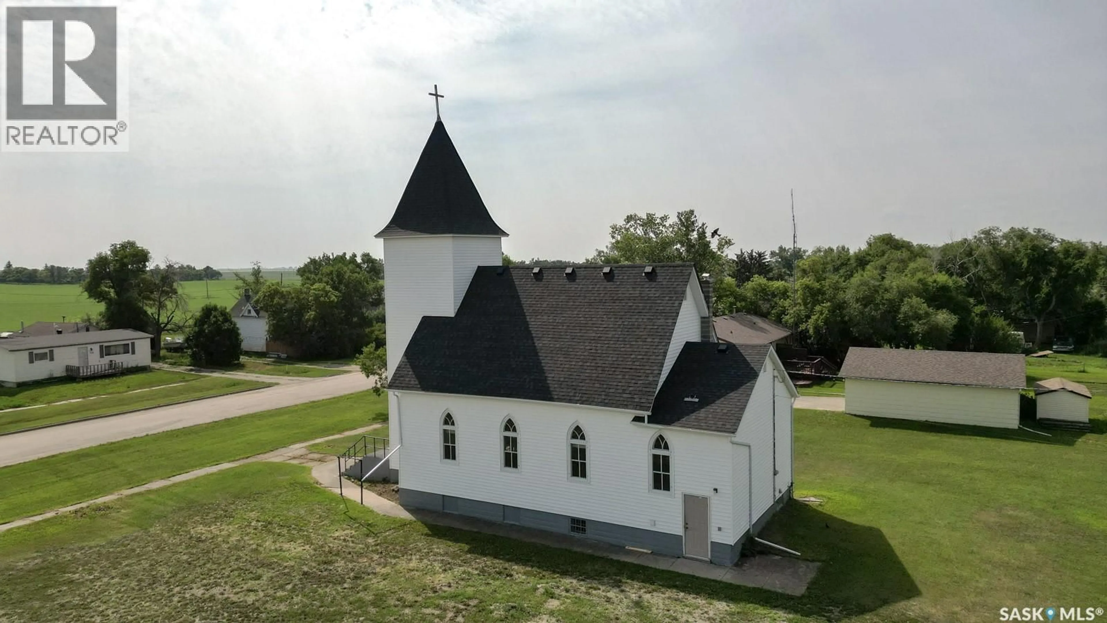 A pic from outside/outdoor area/front of a property/back of a property/a pic from drone, building for 229 VICTORIA STREET, Lang Saskatchewan S0G2W0