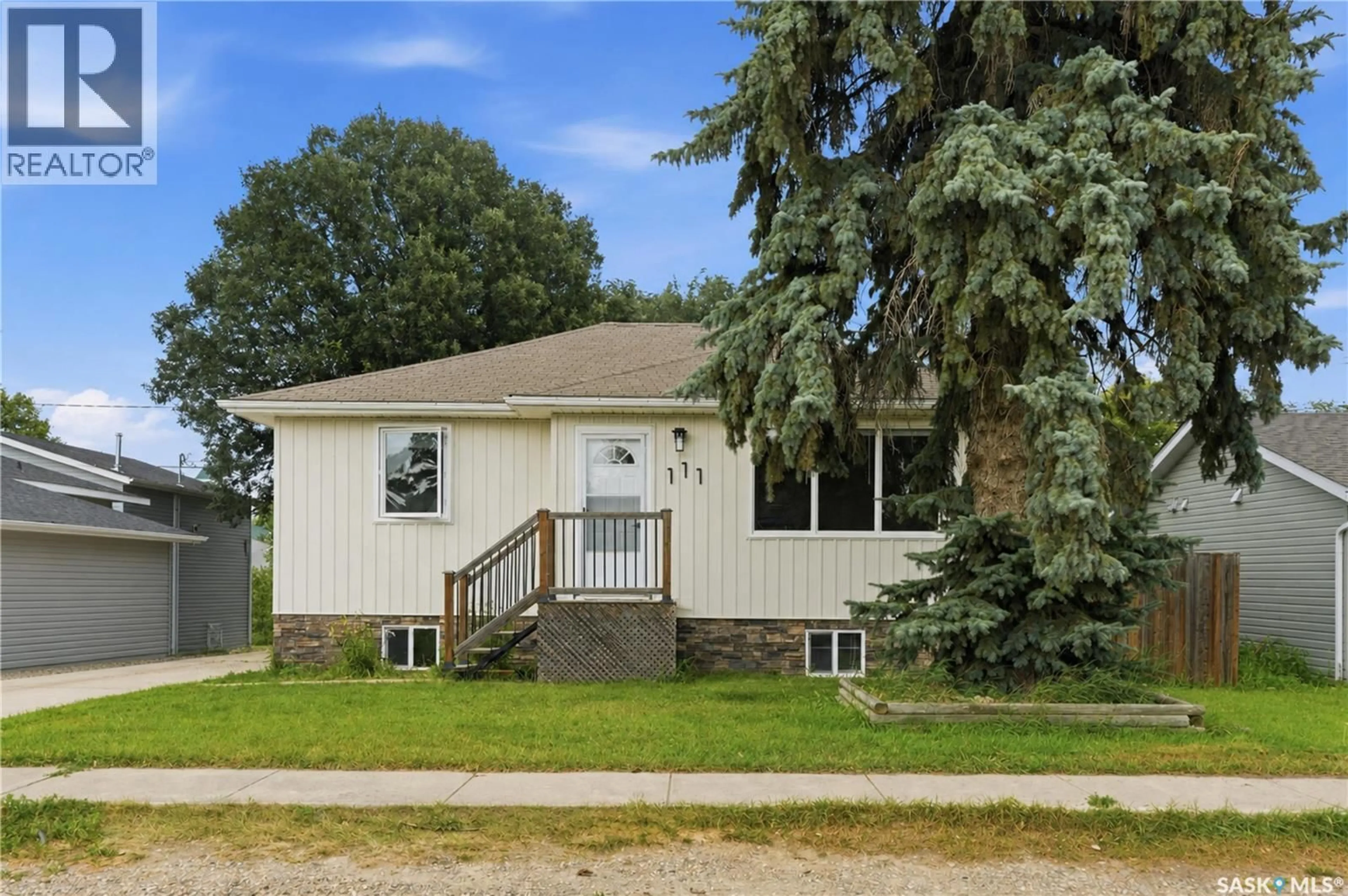 Home with vinyl exterior material, street for 111 3RD STREET, Hague Saskatchewan S0K1X0
