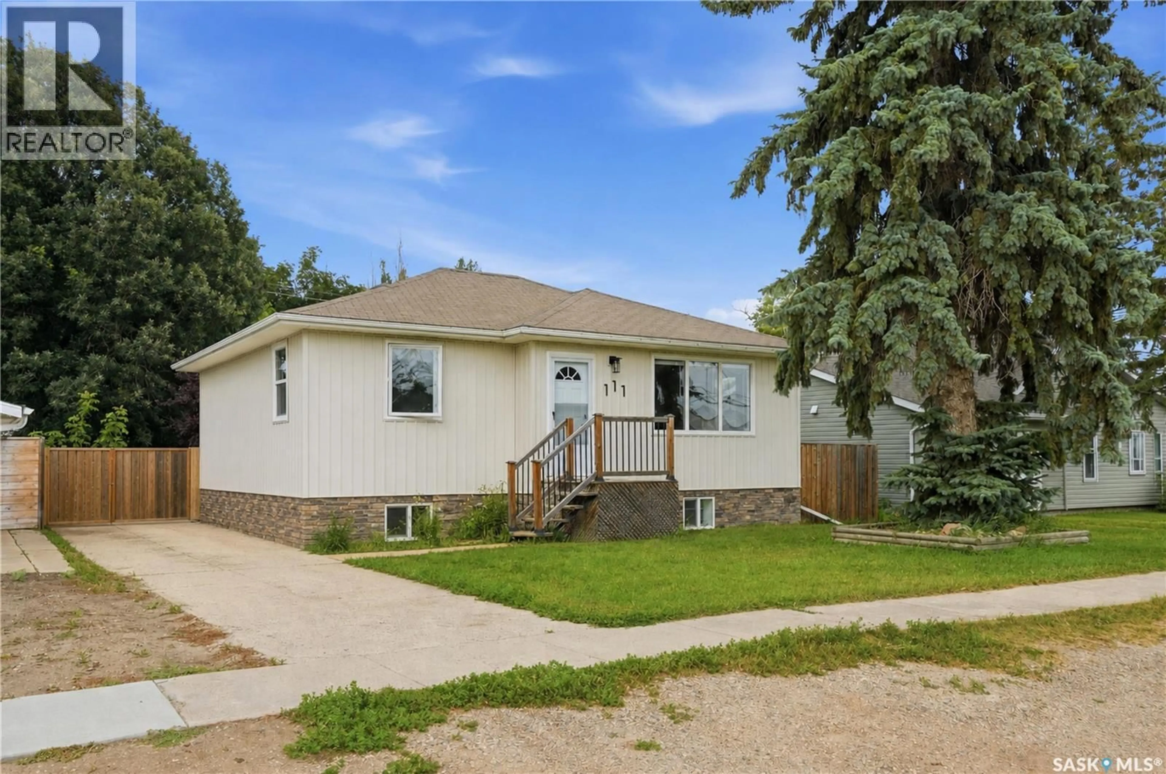 Home with vinyl exterior material, street for 111 3RD STREET, Hague Saskatchewan S0K1X0