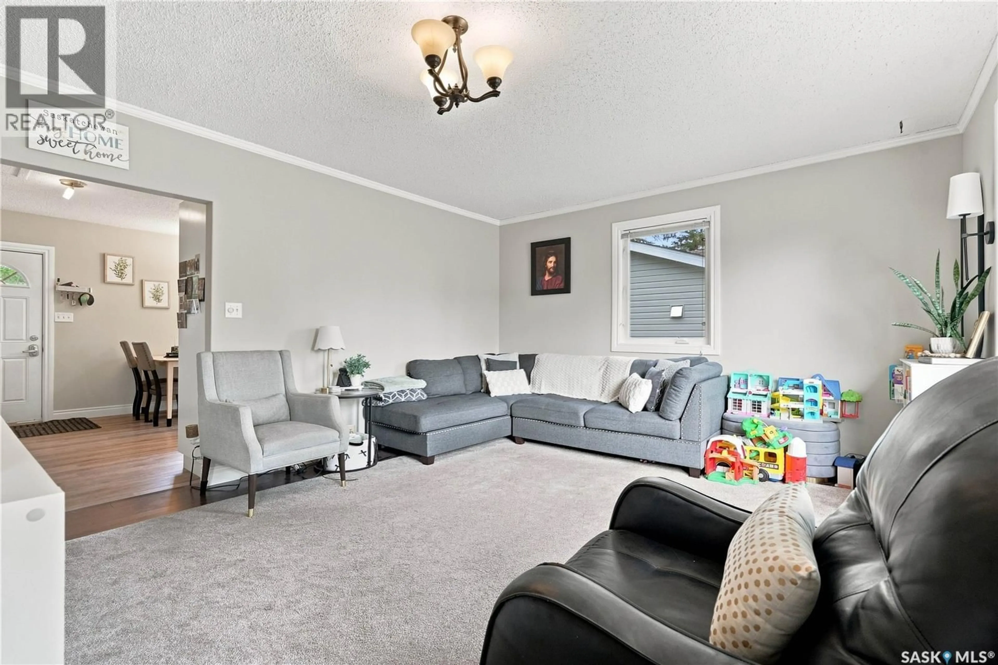 Living room with furniture, carpet floor for 111 3RD STREET, Hague Saskatchewan S0K1X0