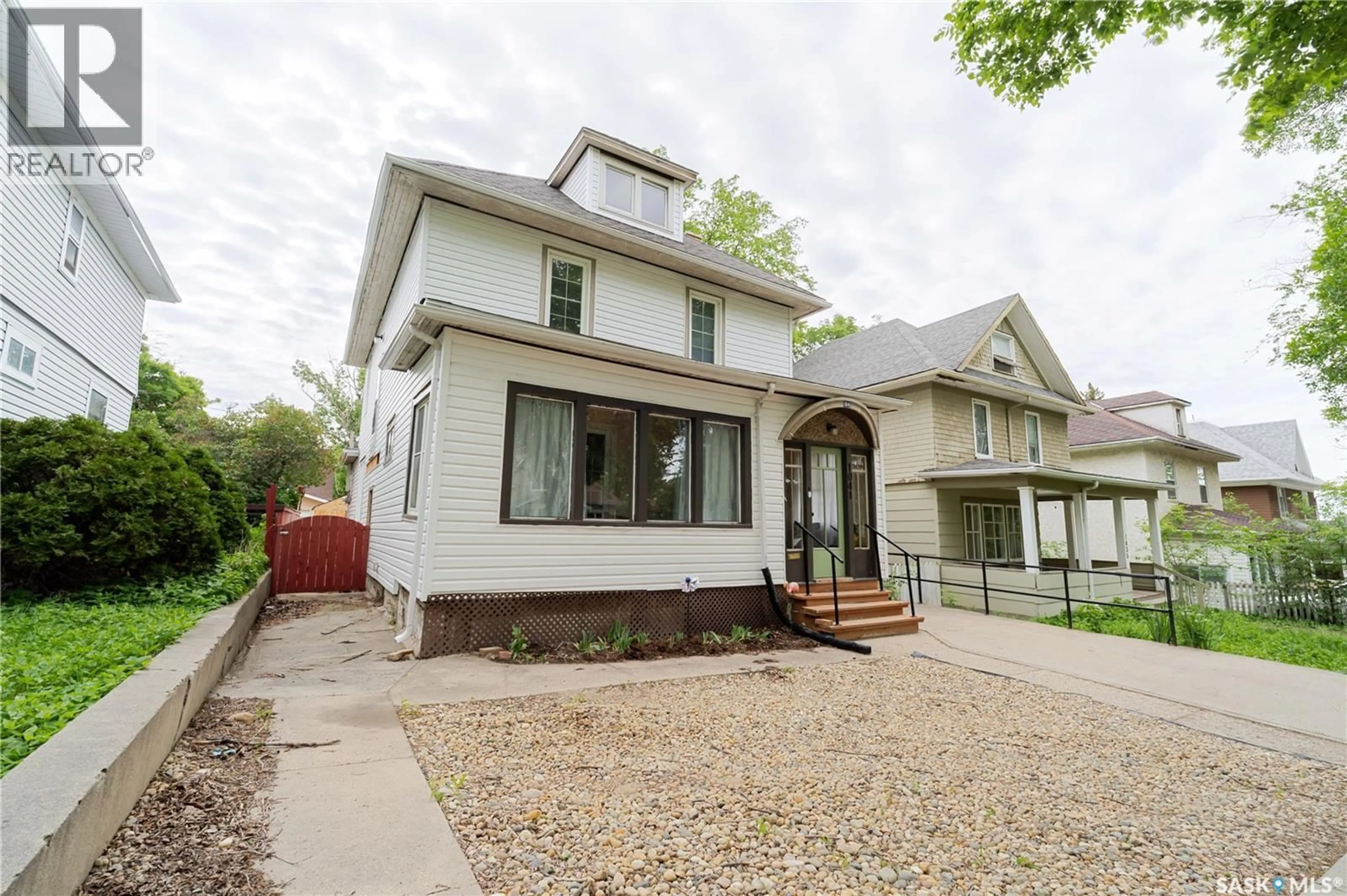 Home with brick exterior material, street for 1041 2ND AVENUE, Moose Jaw Saskatchewan S6H3R3