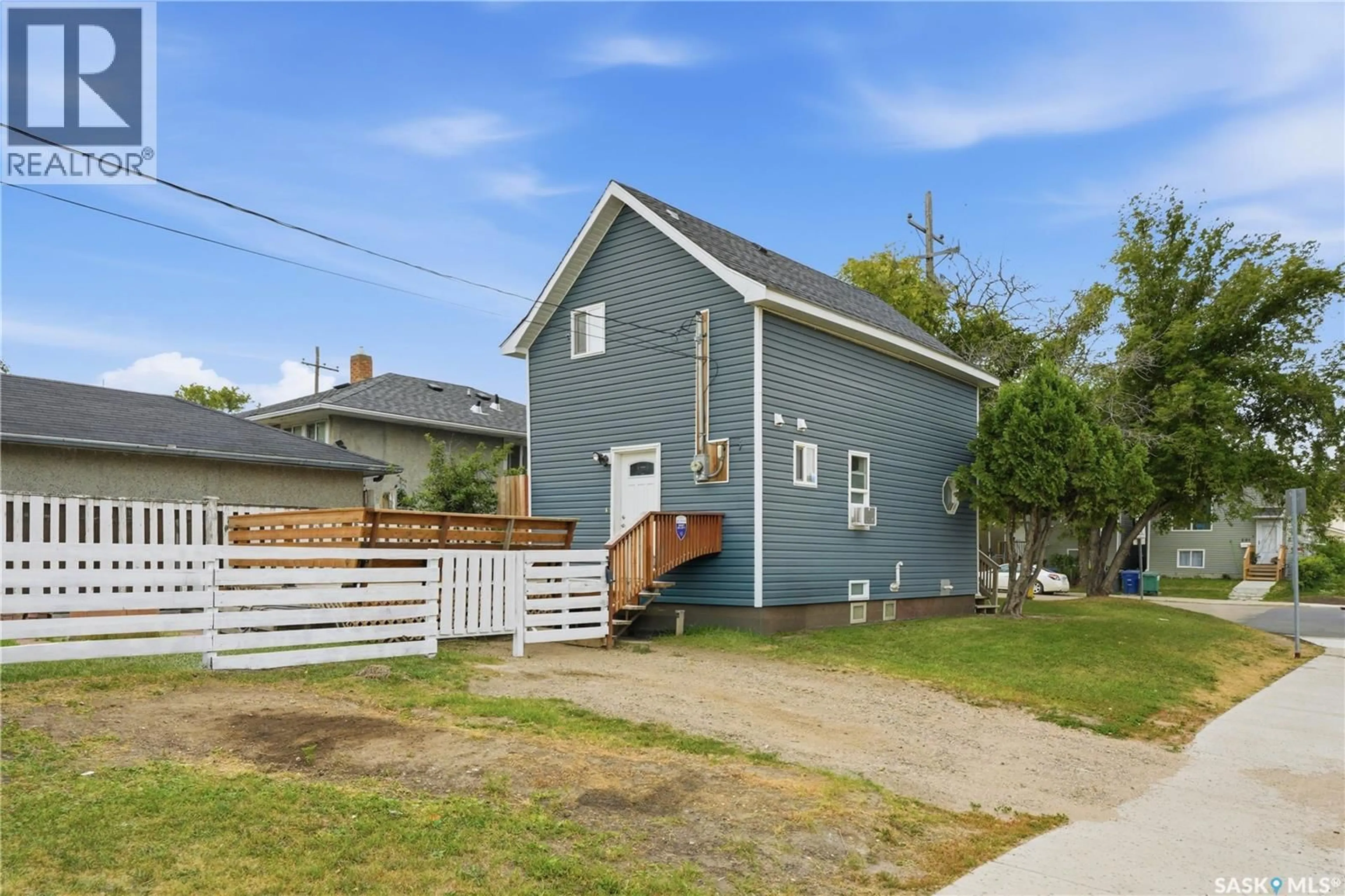 A pic from outside/outdoor area/front of a property/back of a property/a pic from drone, street for 202 W AVENUE S, Saskatoon Saskatchewan S7M3G3