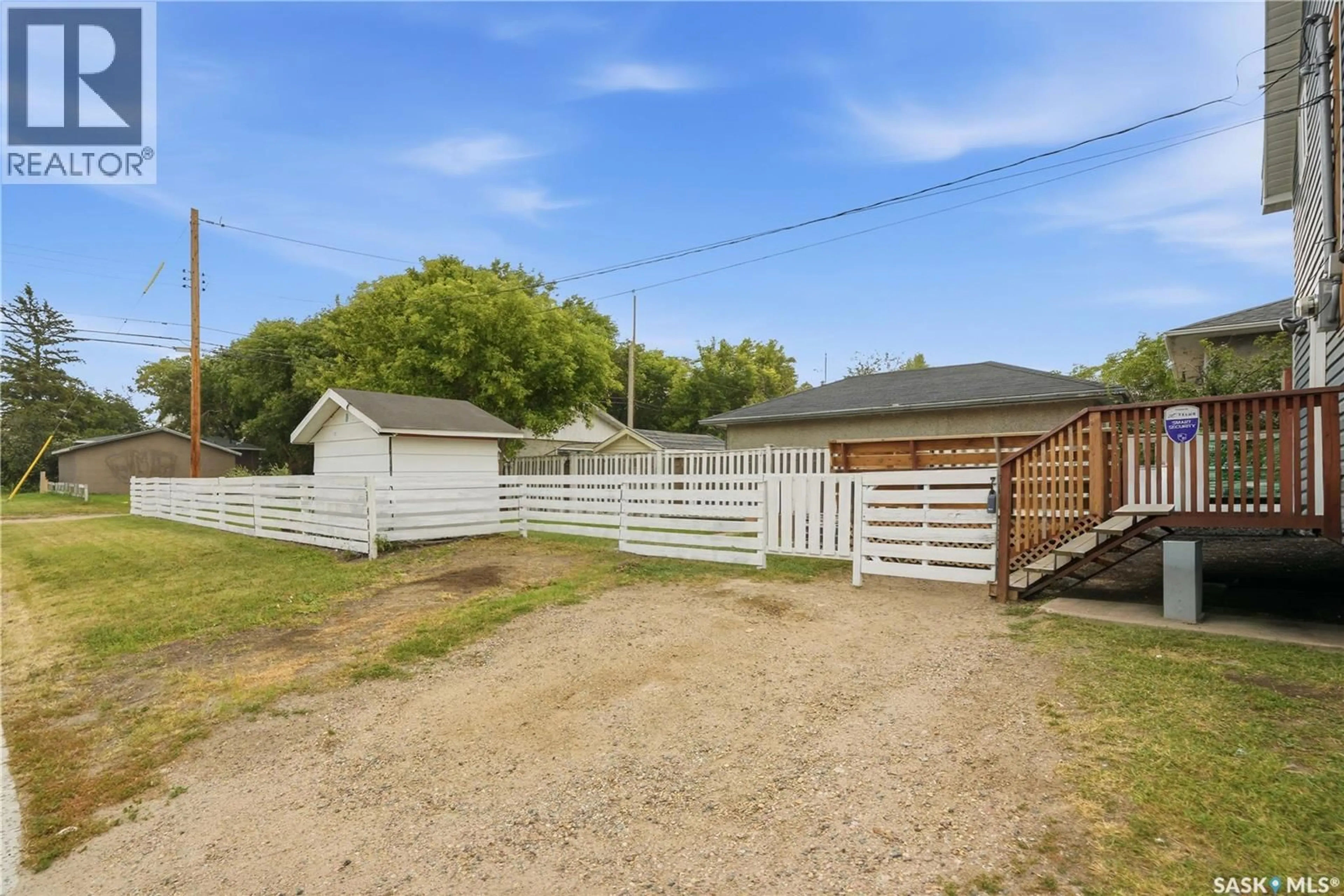 A pic from outside/outdoor area/front of a property/back of a property/a pic from drone, street for 202 W AVENUE S, Saskatoon Saskatchewan S7M3G3