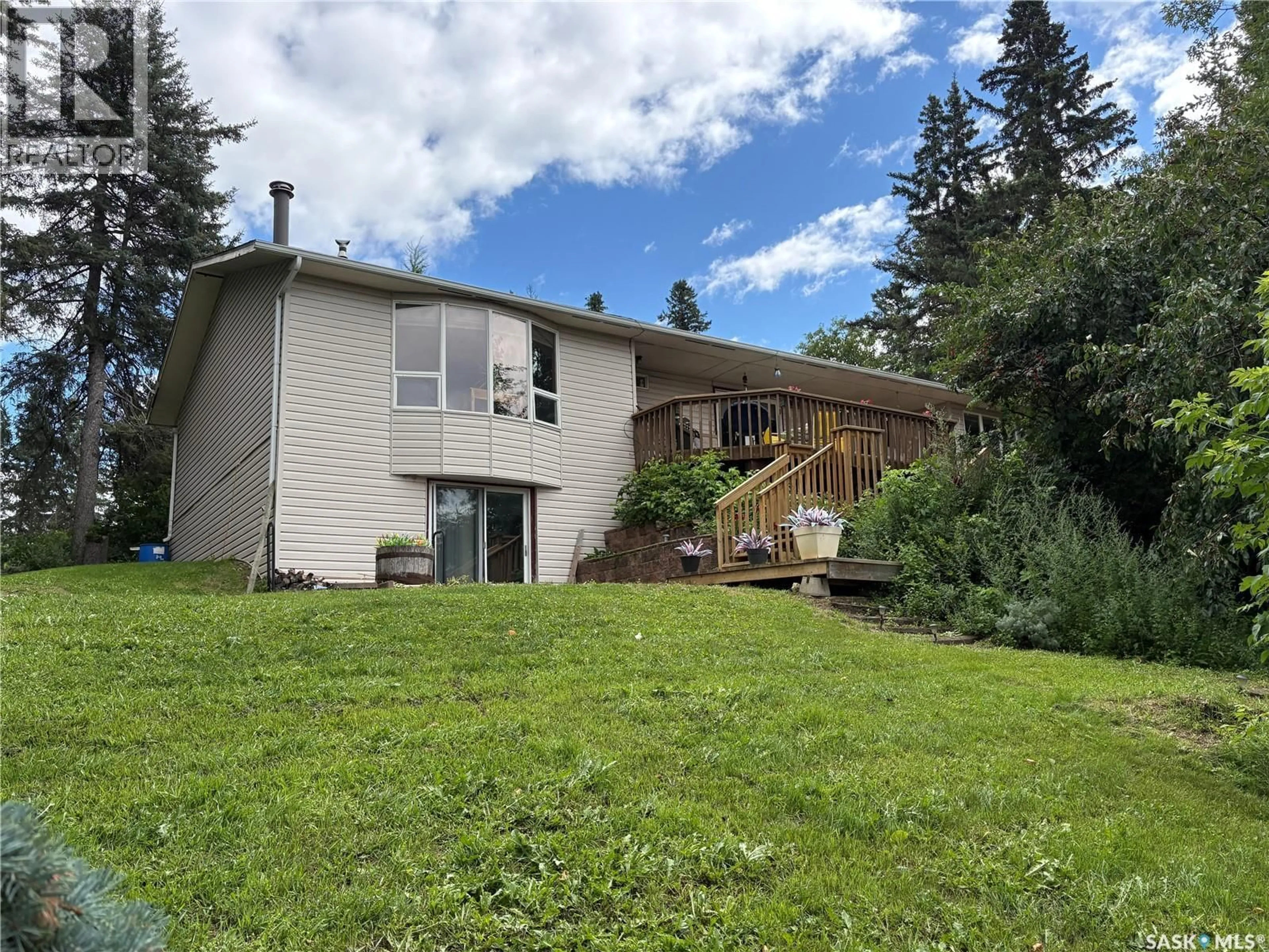 A pic from outside/outdoor area/front of a property/back of a property/a pic from drone, mountain view for 340 JOHNSON AVENUE, Big River Saskatchewan S0J0E0