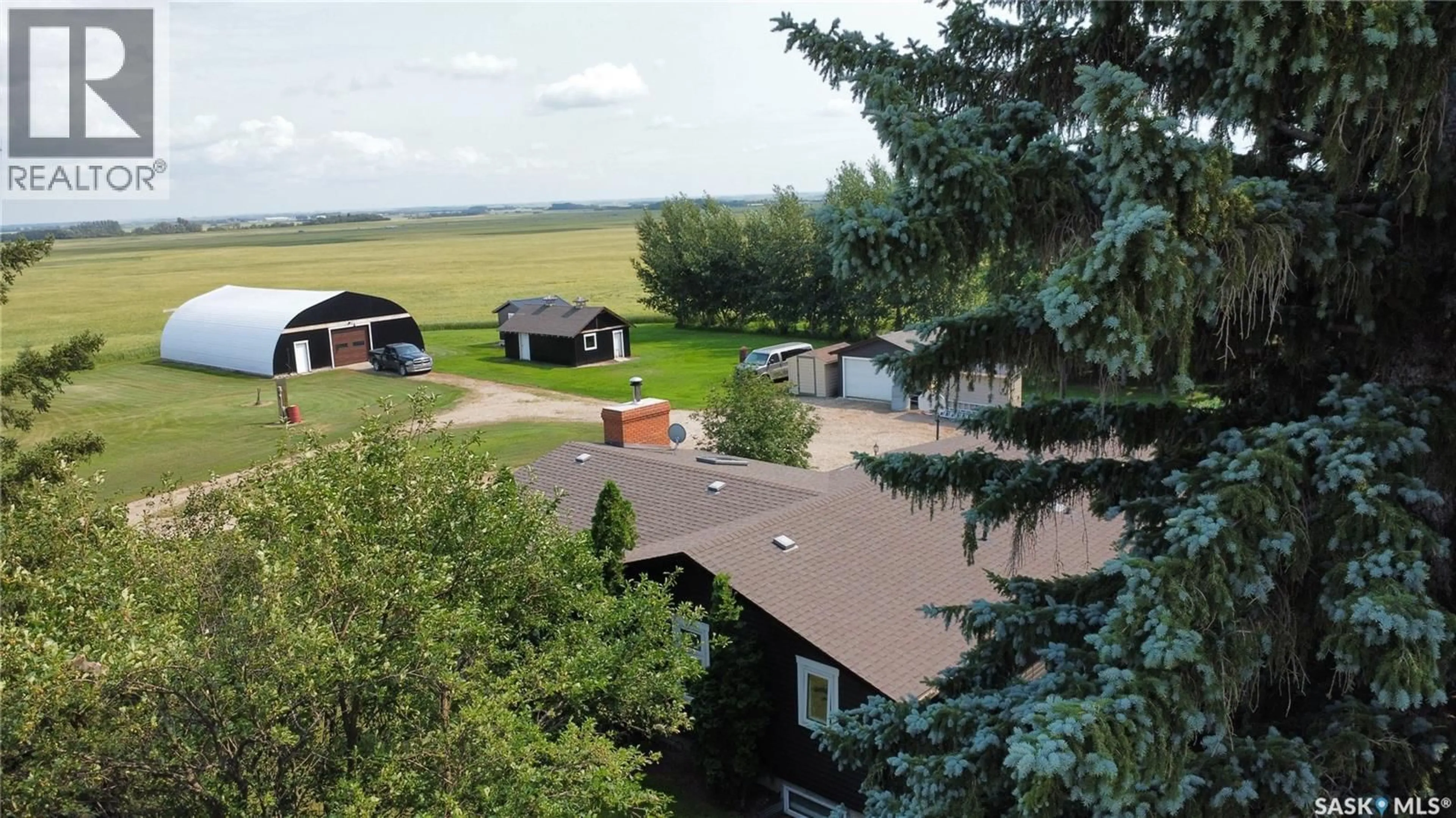A pic from outside/outdoor area/front of a property/back of a property/a pic from drone, mountain view for HAGUE ACREAGE, Rosthern Rm No. 403 Saskatchewan S0K1X0
