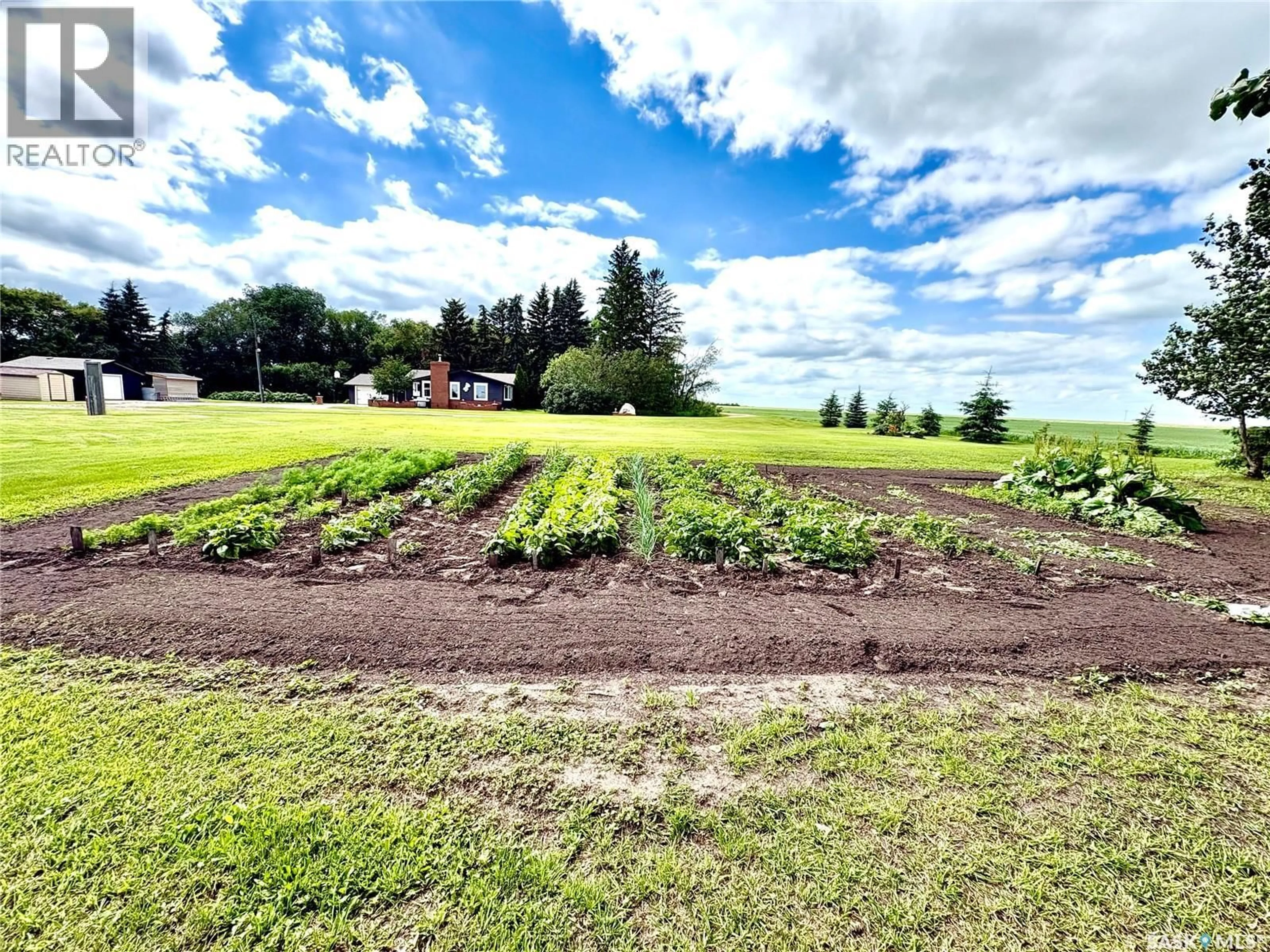 A pic from outside/outdoor area/front of a property/back of a property/a pic from drone, unknown for HAGUE ACREAGE, Rosthern Rm No. 403 Saskatchewan S0K1X0
