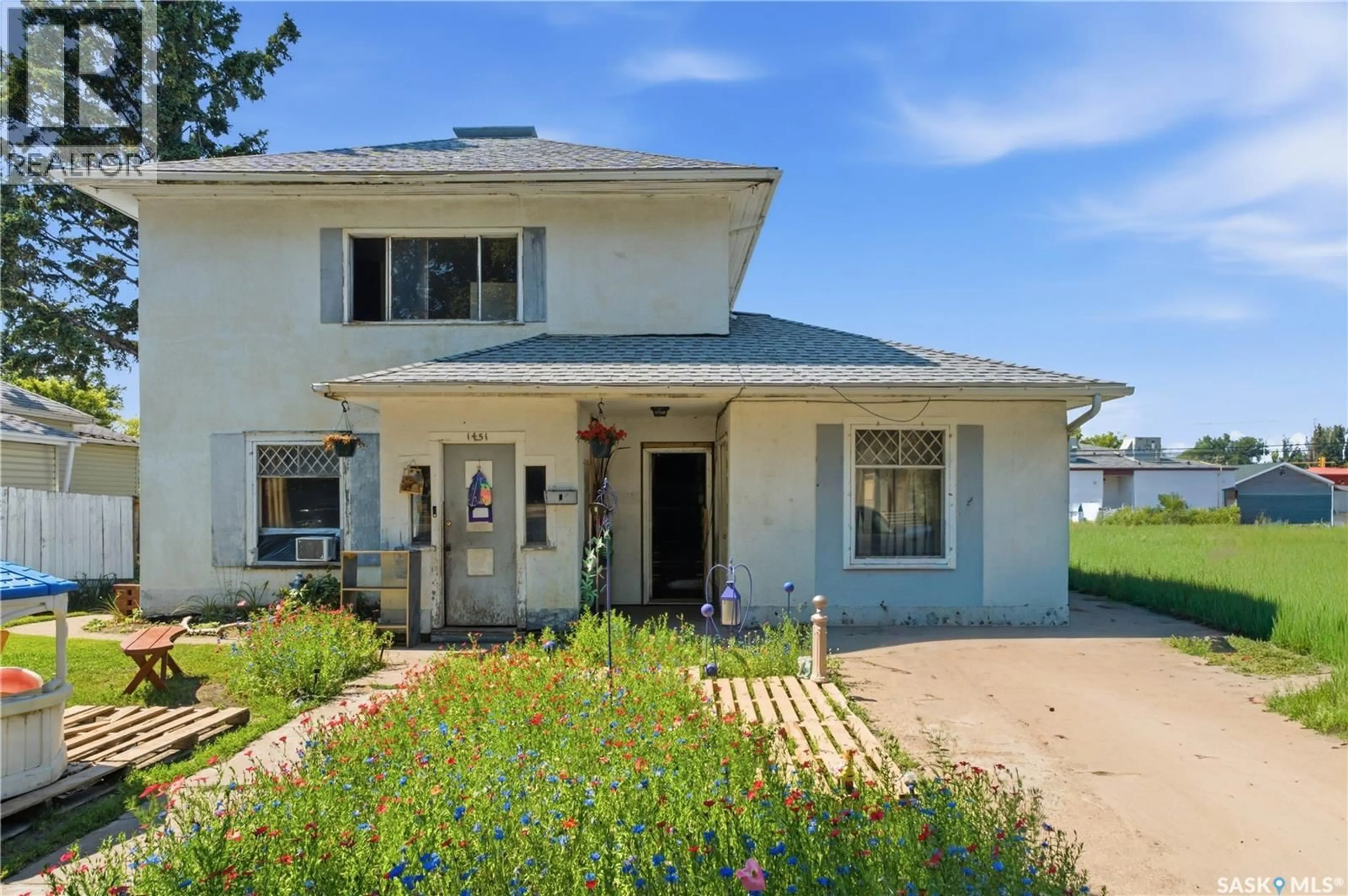 Home with vinyl exterior material, unknown for 1451 101ST STREET, North Battleford Saskatchewan S9A1A1