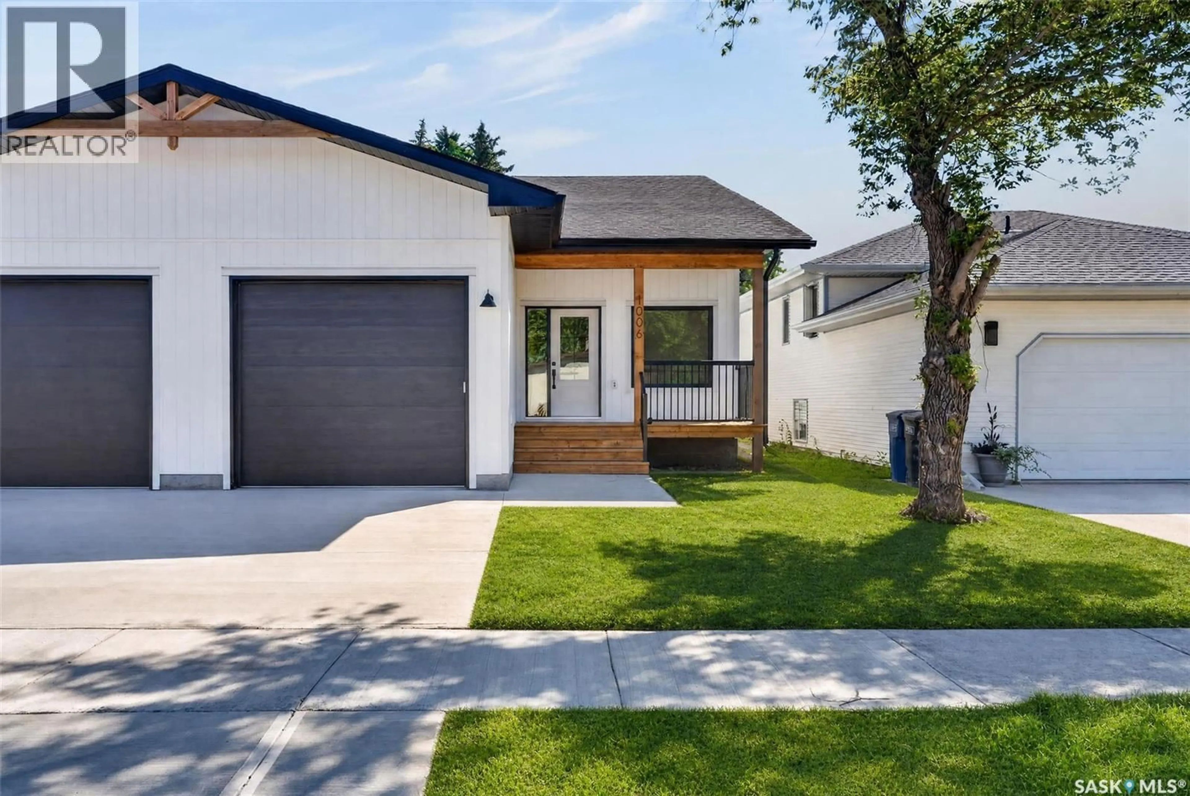 Home with vinyl exterior material, street for 1006 10TH STREET, Humboldt Saskatchewan S0K2A0