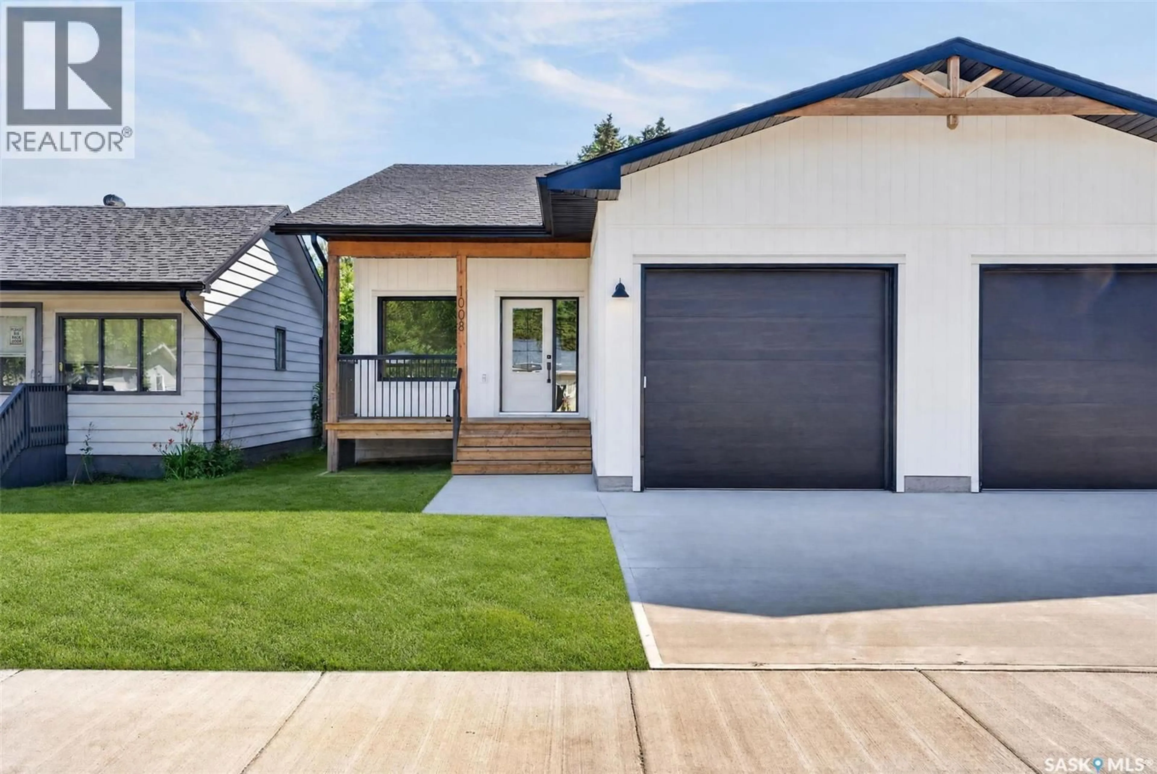 Home with vinyl exterior material, street for 1008 10TH STREET, Humboldt Saskatchewan S0K2A0