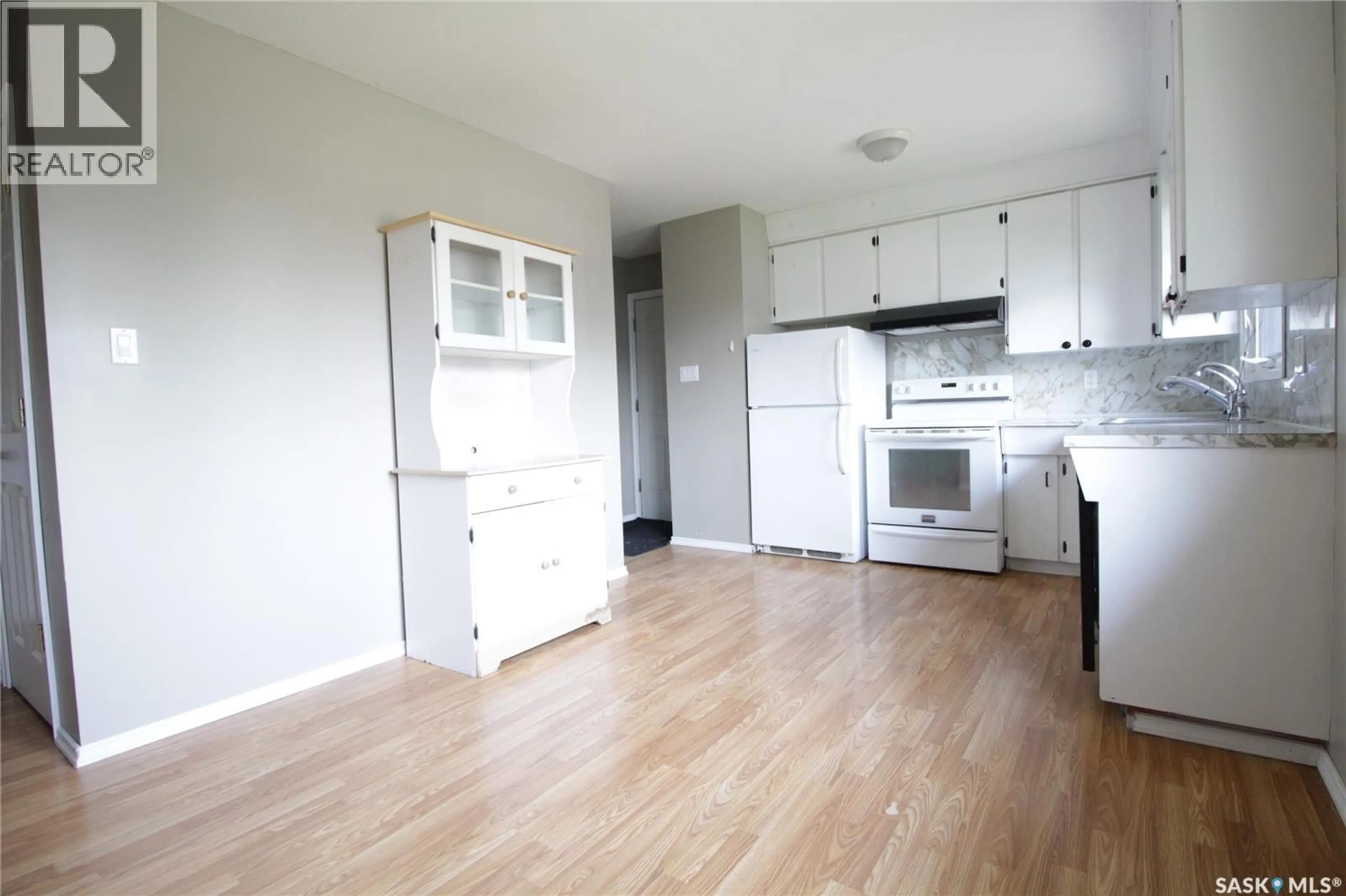 Standard kitchen, wood/laminate floor for 906 OGILVIE STREET, Moosomin Saskatchewan S0G3N0