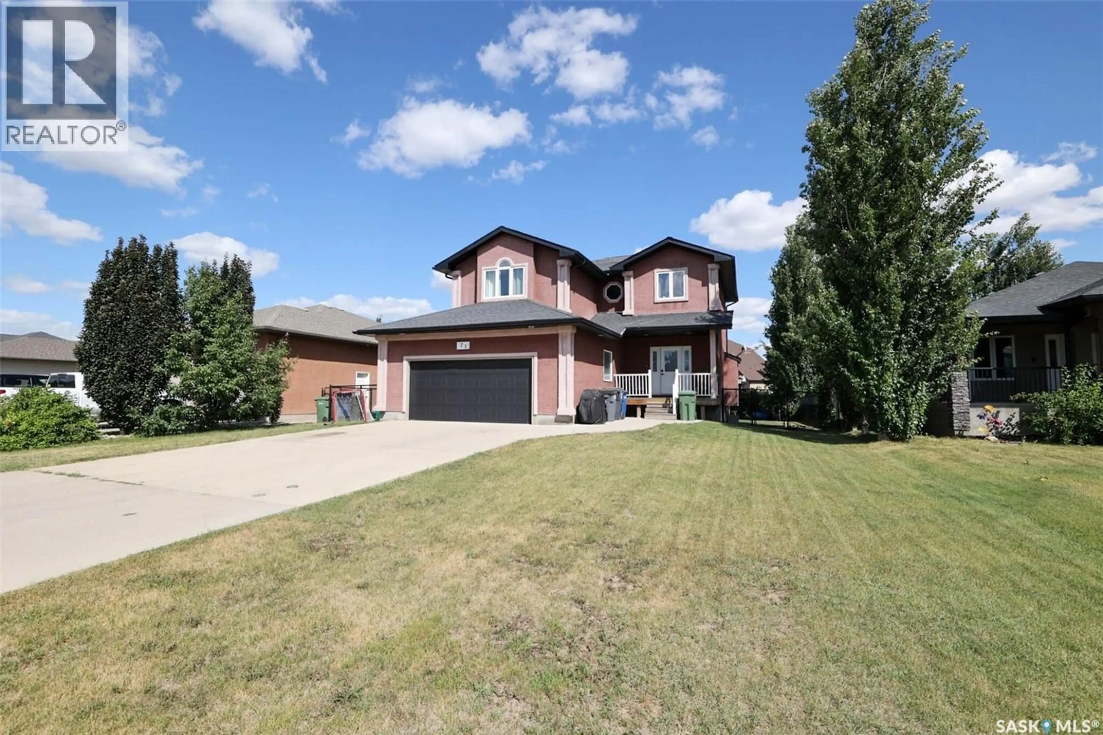 Home with brick exterior material, street for 71 FAIRWAY CRESCENT, White City Saskatchewan S4L0A5