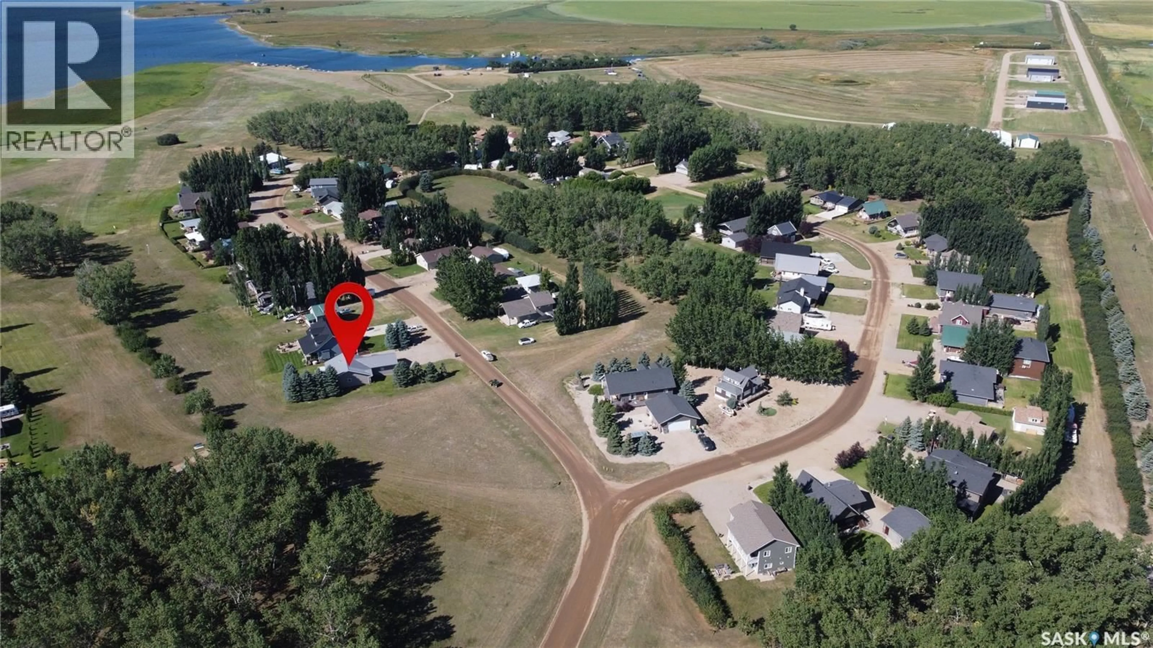 A pic from outside/outdoor area/front of a property/back of a property/a pic from drone, water/lake/river/ocean view for 401 VIVIAN BAY, Coteau Rm No. 255 Saskatchewan S0L0G0