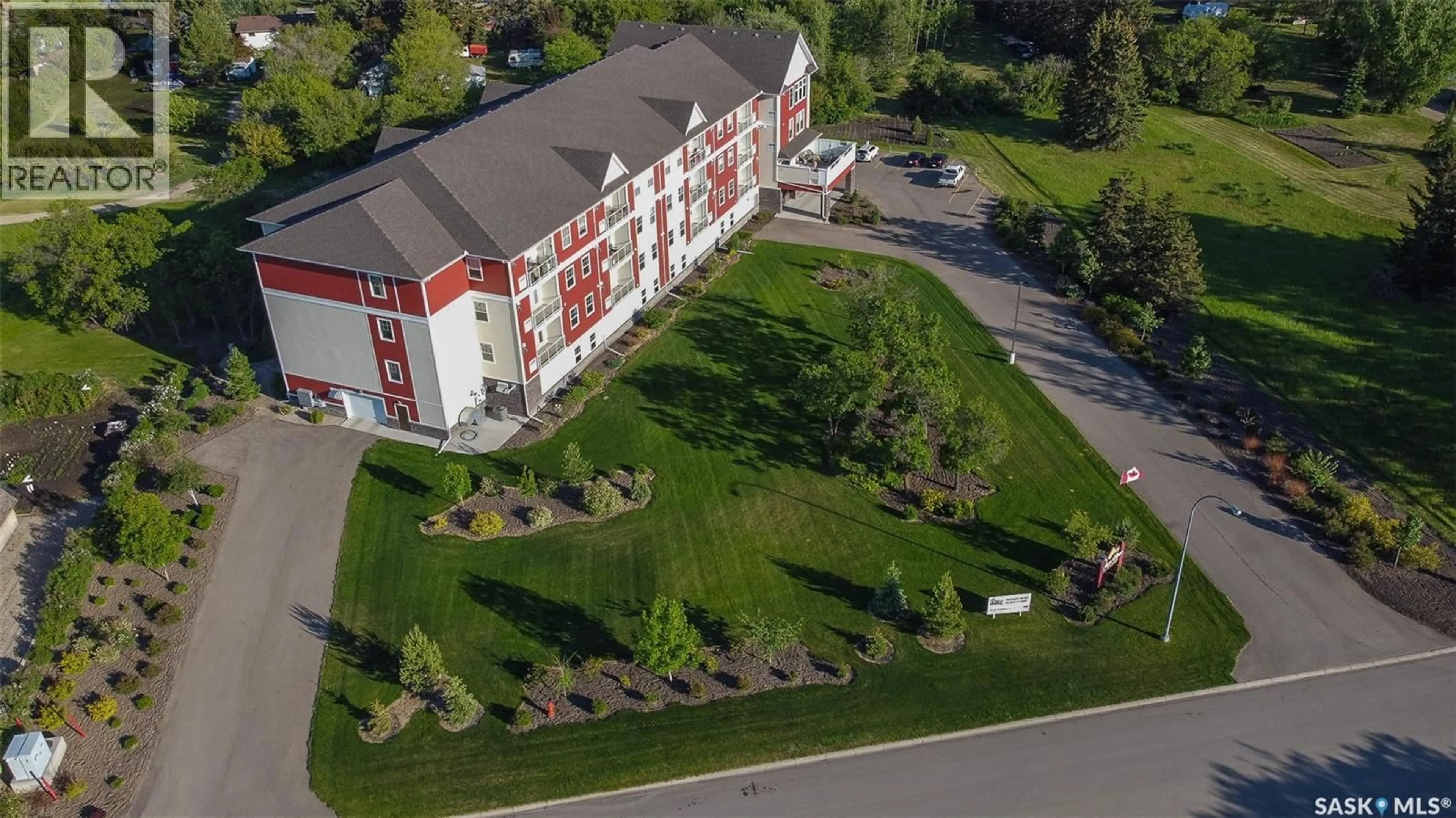 A pic from outside/outdoor area/front of a property/back of a property/a pic from drone, building for 301 912 OTTERLOO STREET, Indian Head Saskatchewan S0G2K0