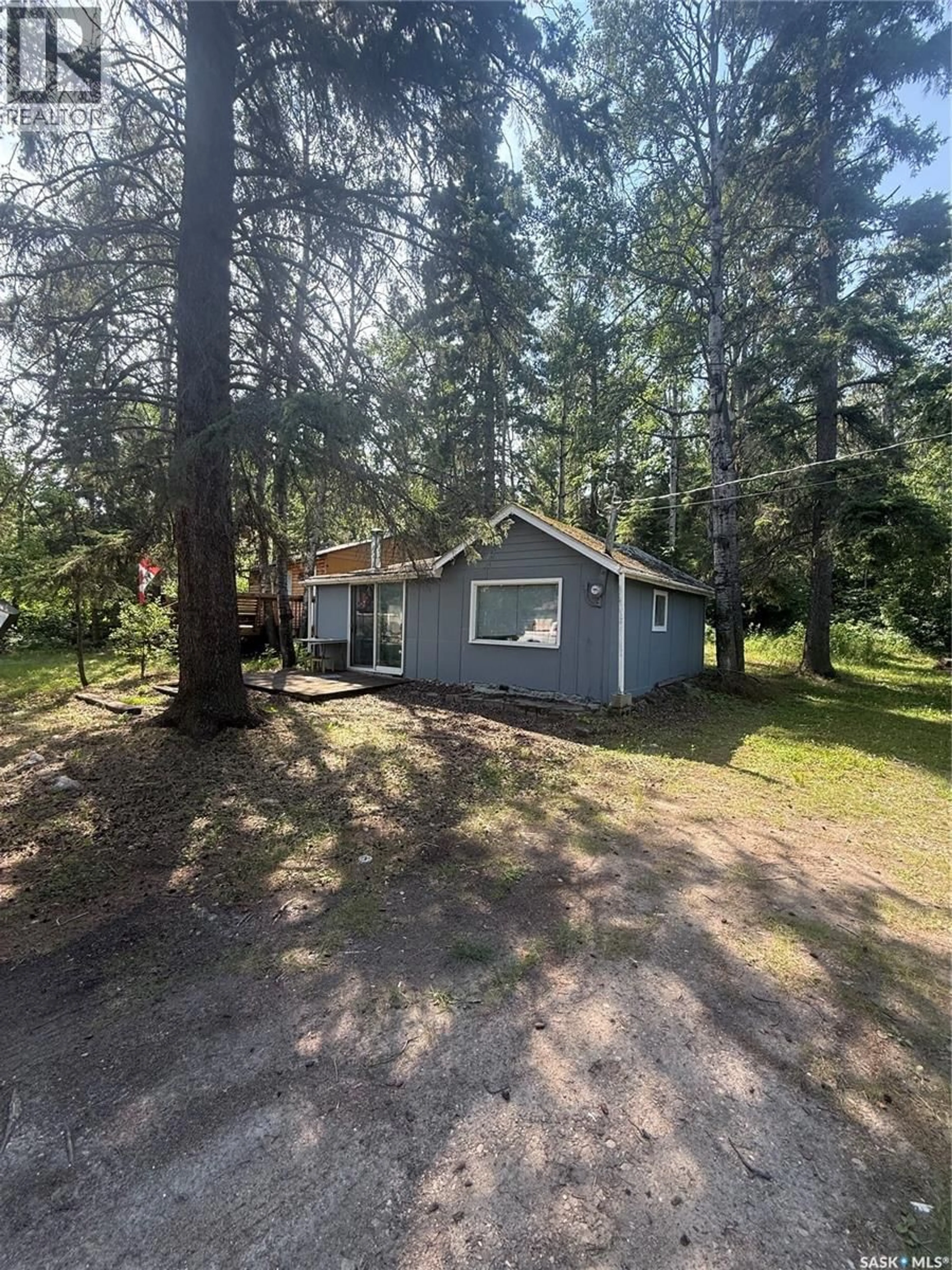 A pic from outside/outdoor area/front of a property/back of a property/a pic from drone, unknown for 106 AGNES STREET, Emma Lake Saskatchewan S7J0N0